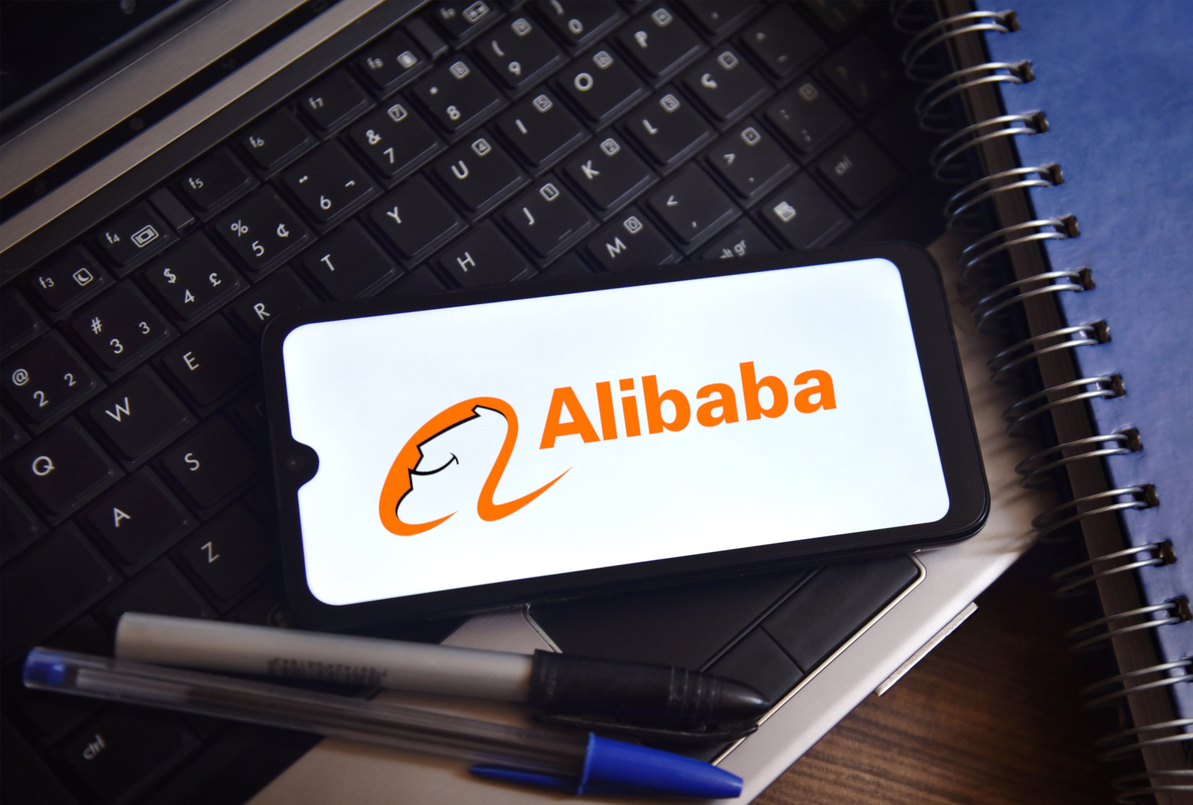 The Alibaba logo is seen on a smartphone screen in this arranged photograph taken March 20, 2025. Photo: Shutterstock Images