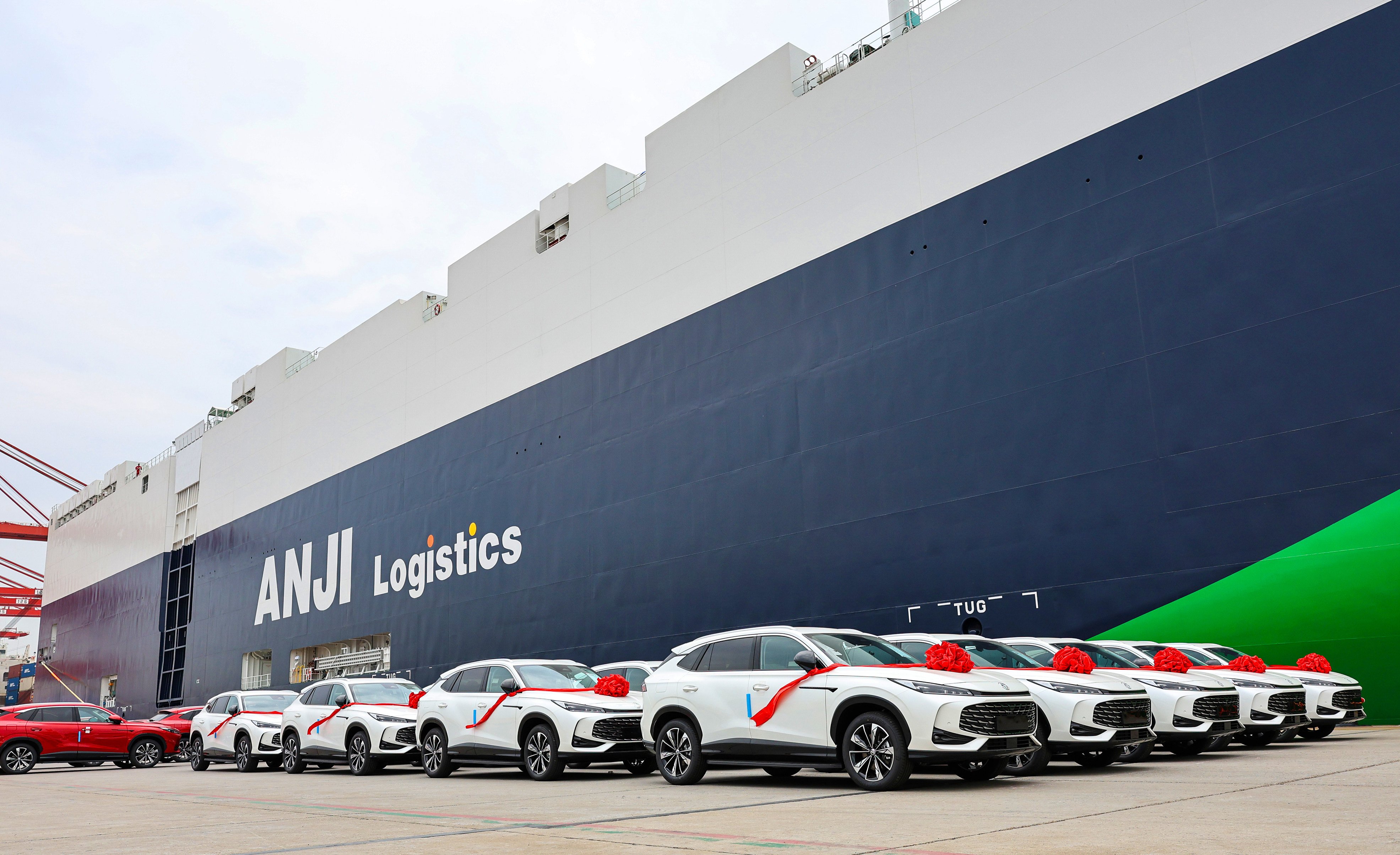 A batch of SAIC MG brand cars are parked next to the Anji Ansheng ship, ready to be loaded. Photo: Xinhua