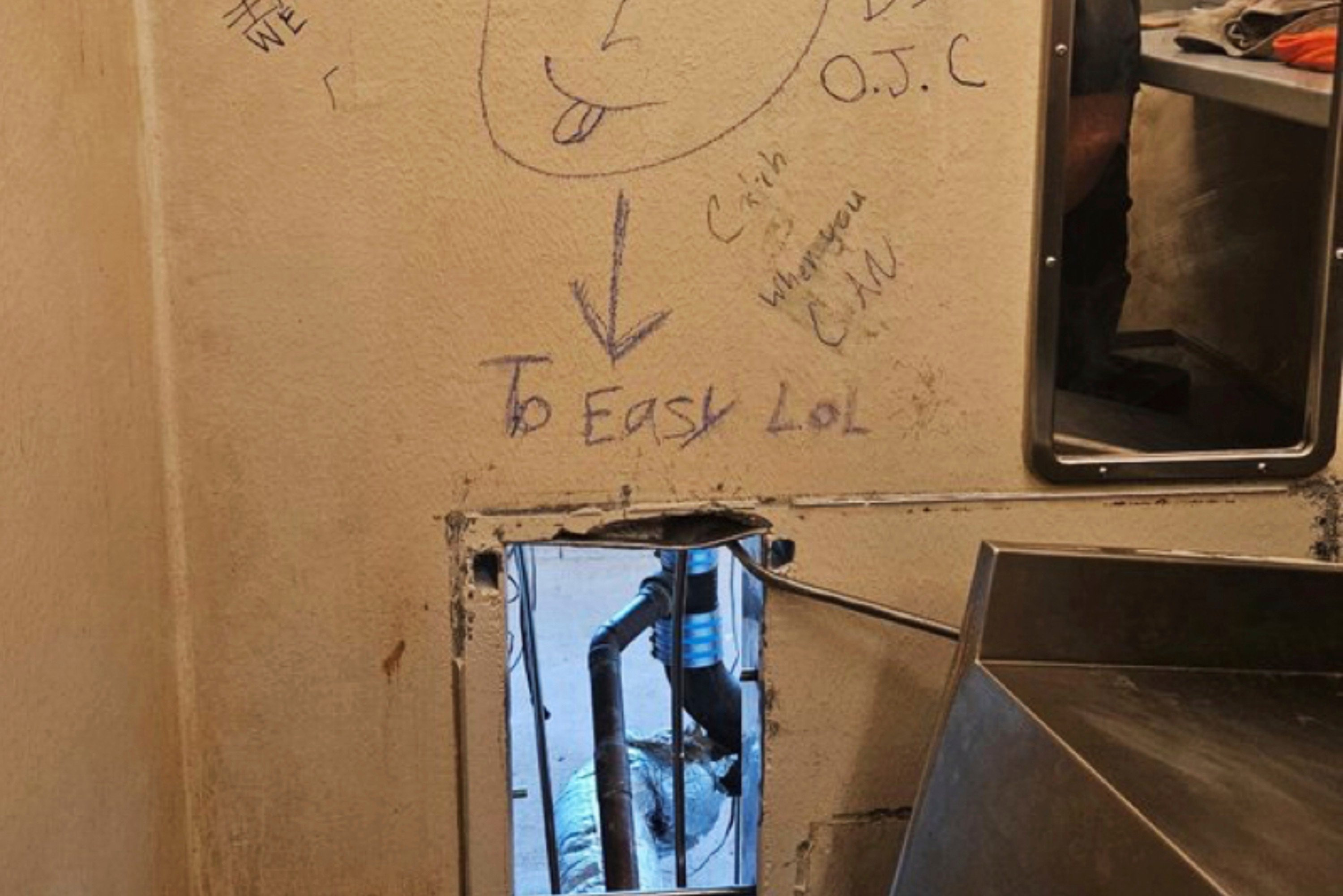 The opening inside a cell at the Orleans Justice Centre  Photo: AP