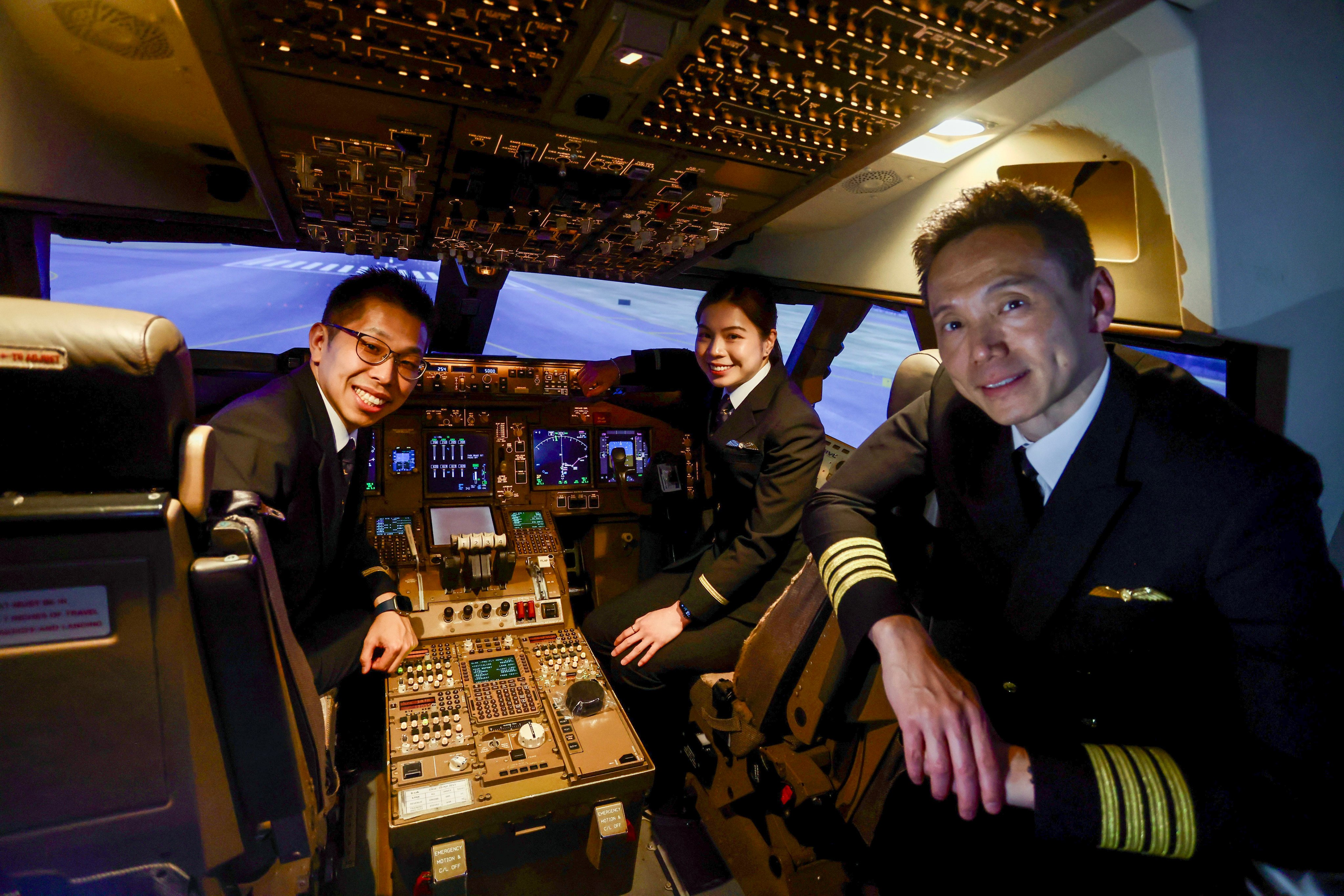 (From left) Cadets Tony Yung and Kellie Chiu with Captain Joe Fung, Cathay’s flying training manager. Photo: Jonathan Wong