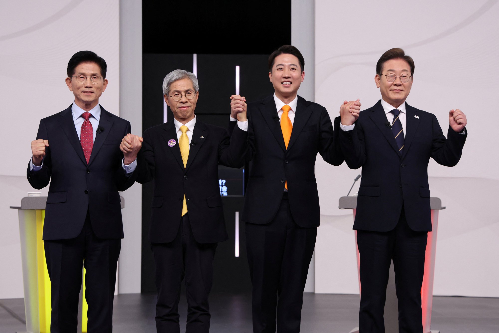 South Korea’s presidential candidates, Kim Moon-soo of the People Power Party (left), Kwon Young-guk of the Democratic Labour Party (centre-left), Lee Jun-seok of the New Reform Party (centre-right) and Lee Jae-myung of the Democratic Party ahead of their debate on Sunday. Photo: EPA-EFE South Korea’s presidential candidates, Kim Moon-soo of the People Power Party (left), Kwon Young-guk of the Democratic Labour Party (centre-left), Lee Jun-seok of the New Reform Party (centre-right) and Lee Jae-myung of the Democratic Party ahead of their debate on Sunday. Photo: EPA-EFE