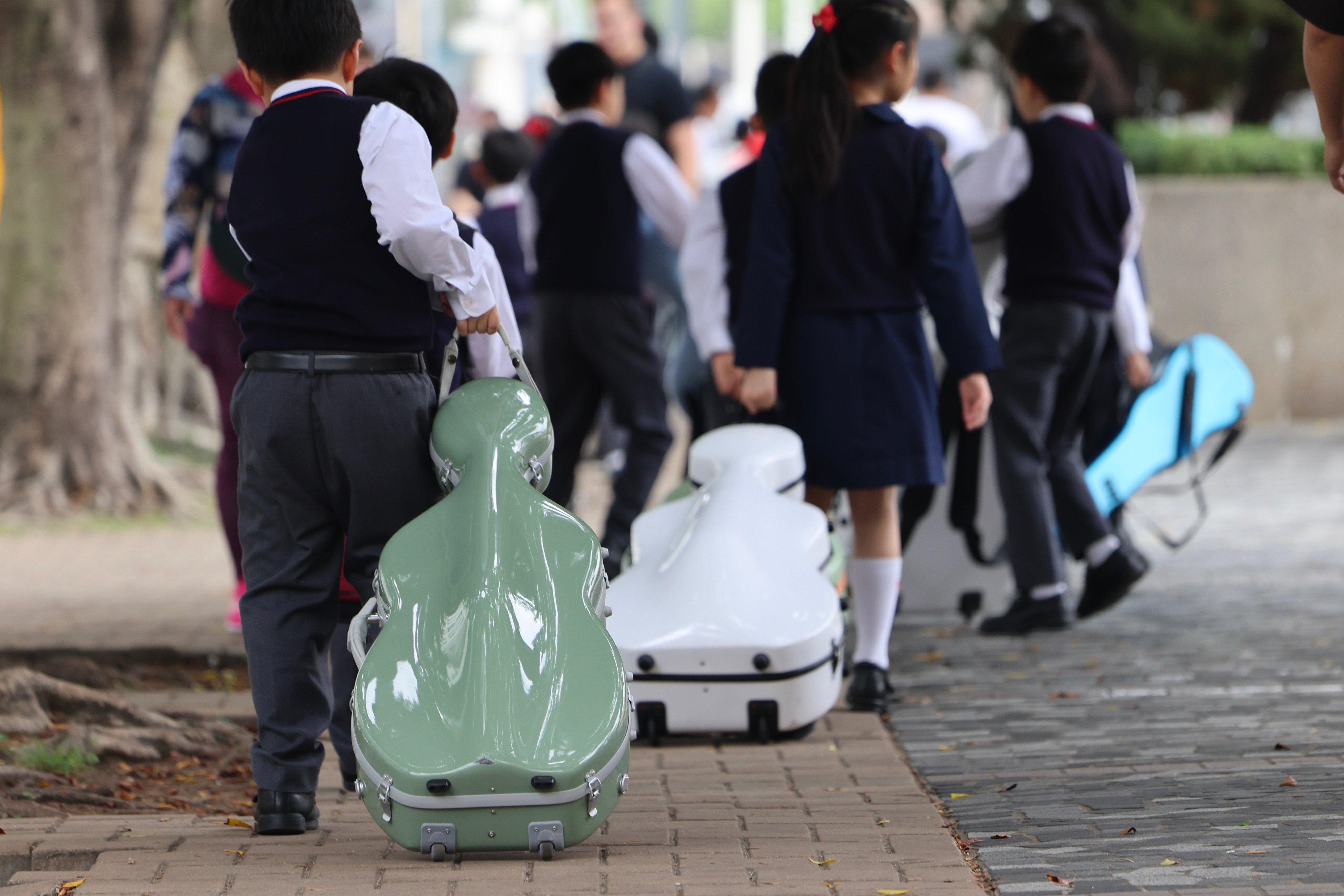 Primary school pupils are seen in Tsim Sha Tsui on April 11. Photo: Jelly Tse