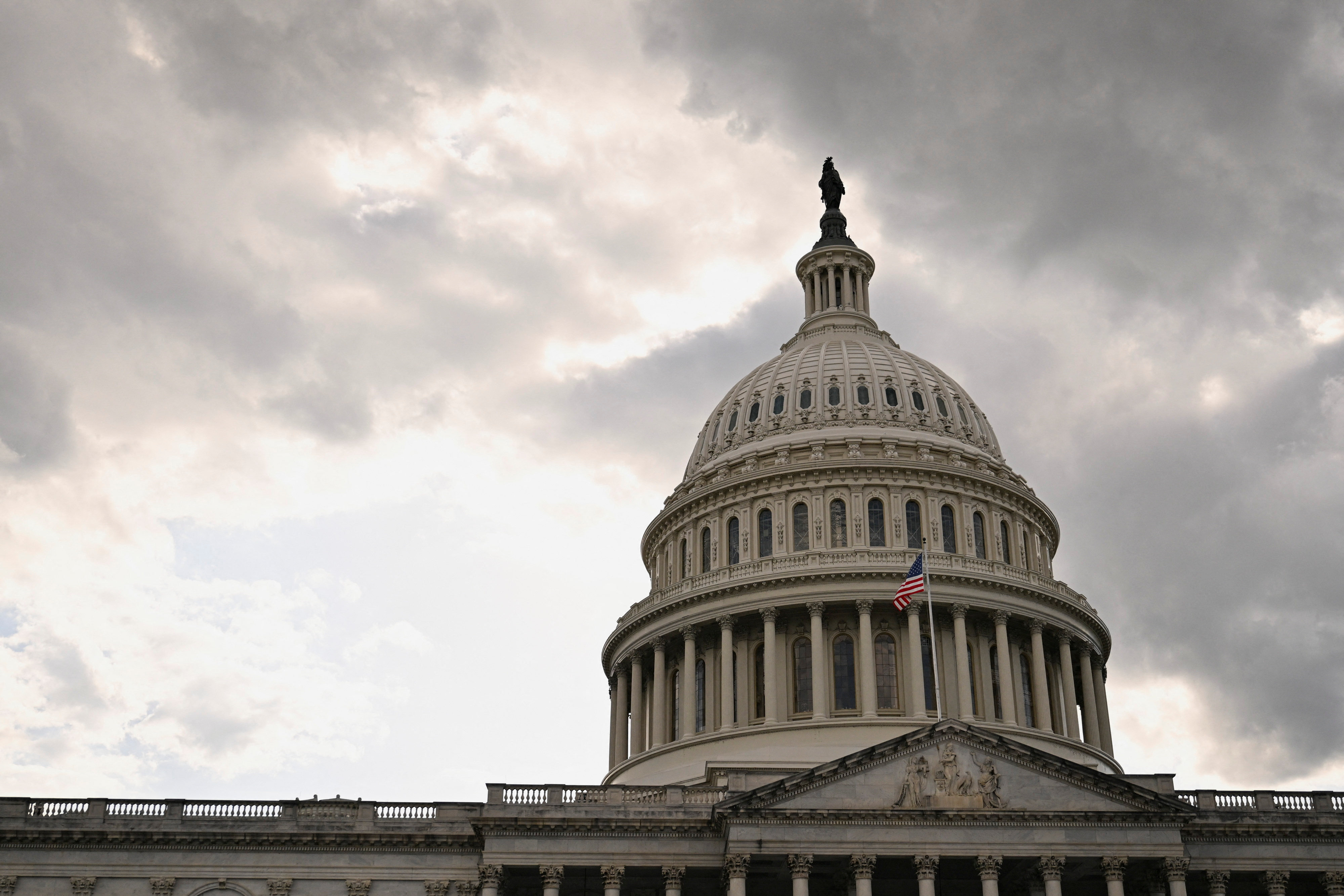 Clouds roll over the US Capitol in Washington ahead of a rare Sunday night session of the House Budget Committee. Photo: Reuters