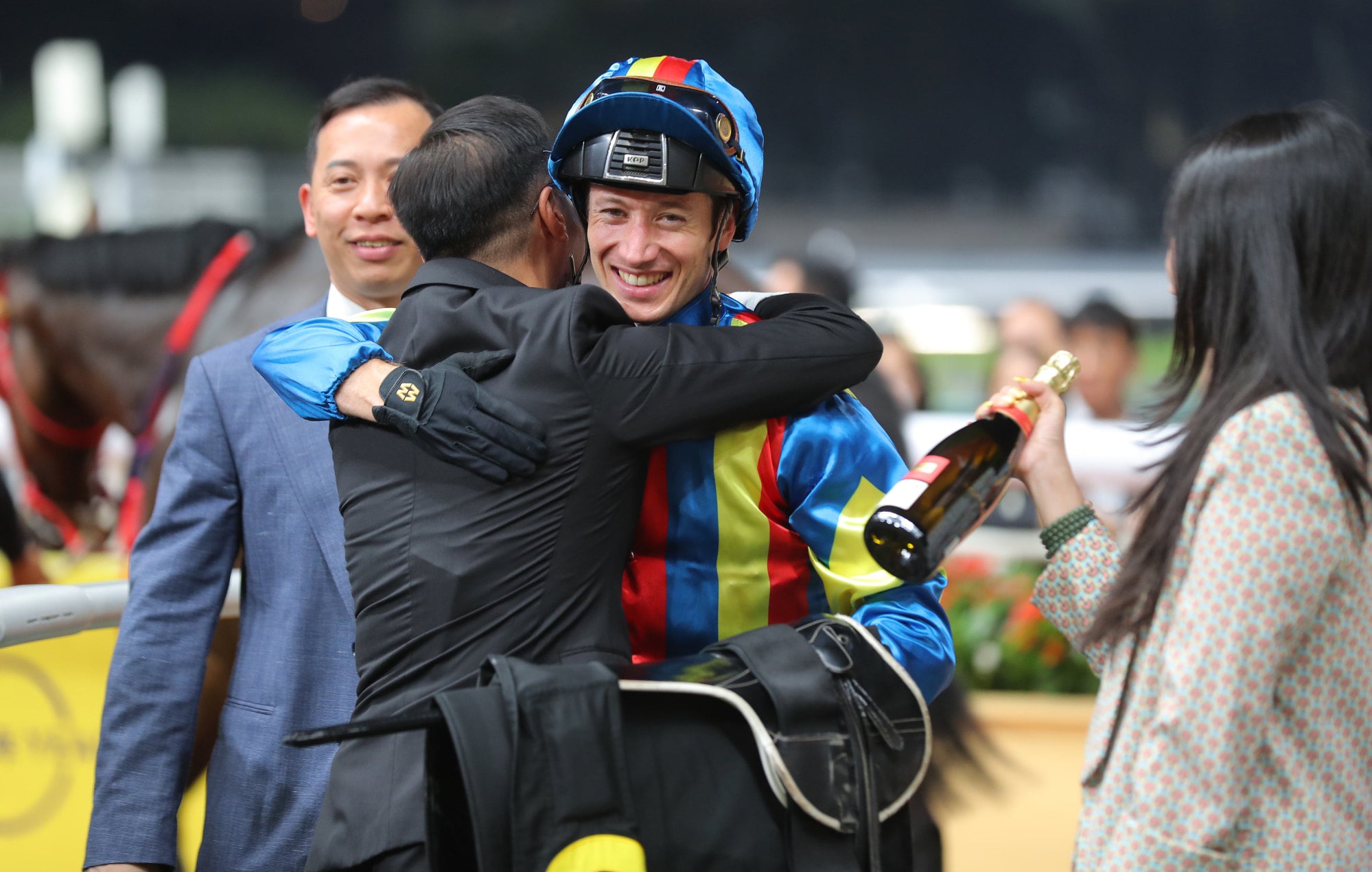 Jockey Antoine Hamelin is all smiles after saluting aboard Happy Fat Cat.