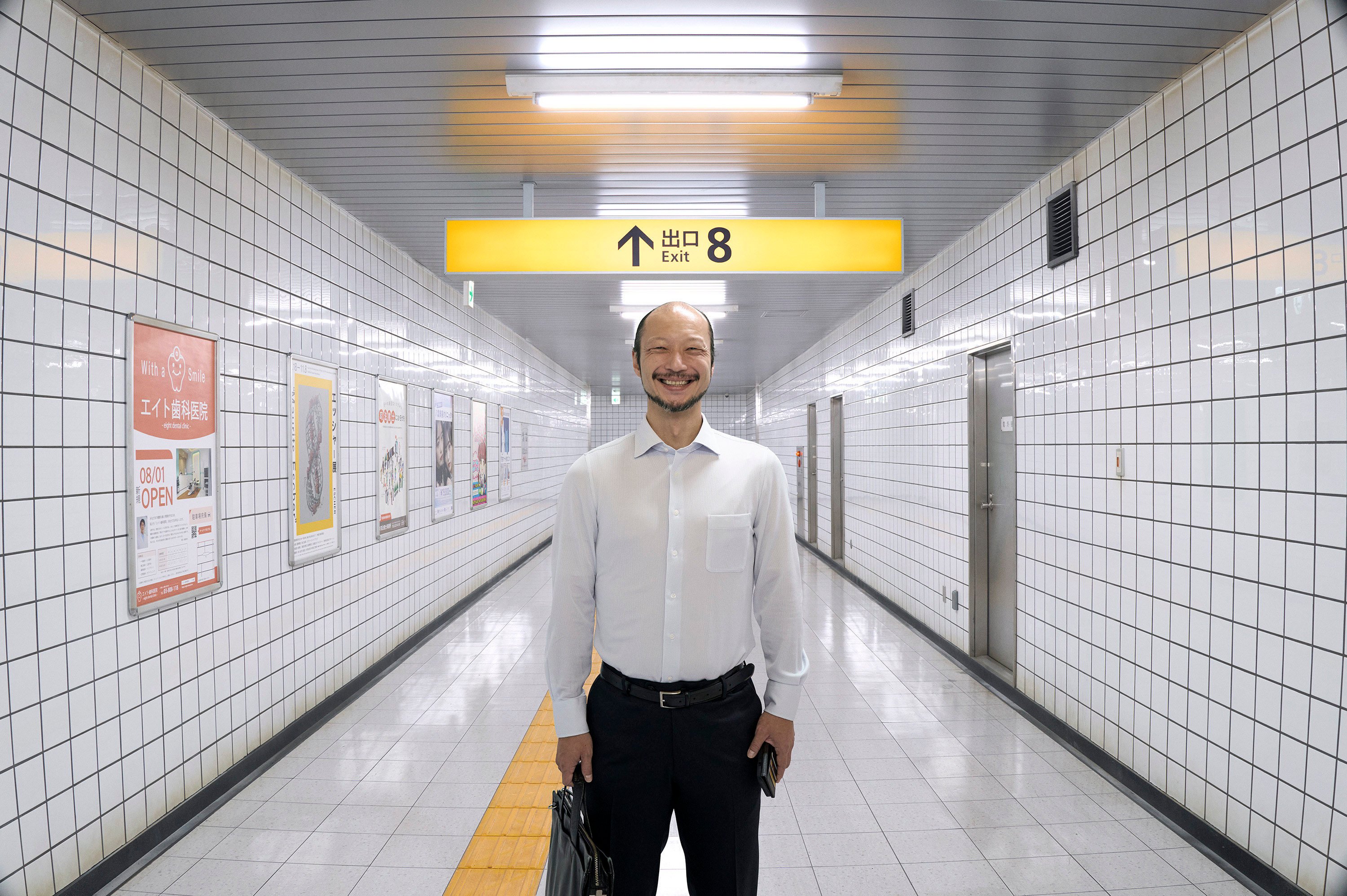 Yamato Kochi as “The Walking Man” in a still from Exit 8. Photo: Handout