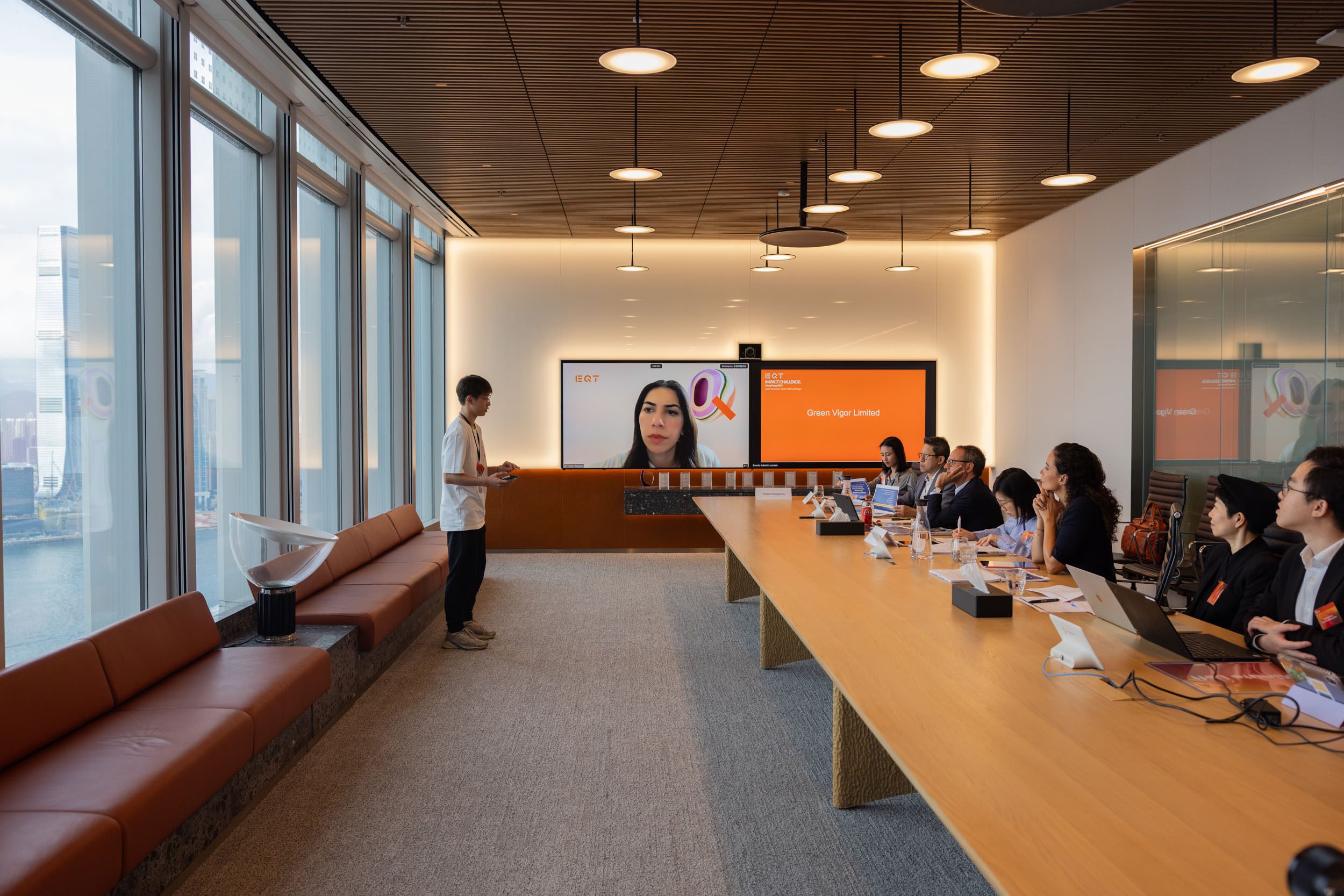 Adrian Li, from Green Vigor, which provides buildings with easy-to-install electricity generating water tanks, makes his business pitch to the panel of jurors during the Jury Deliberation and Finalists Showcase.
