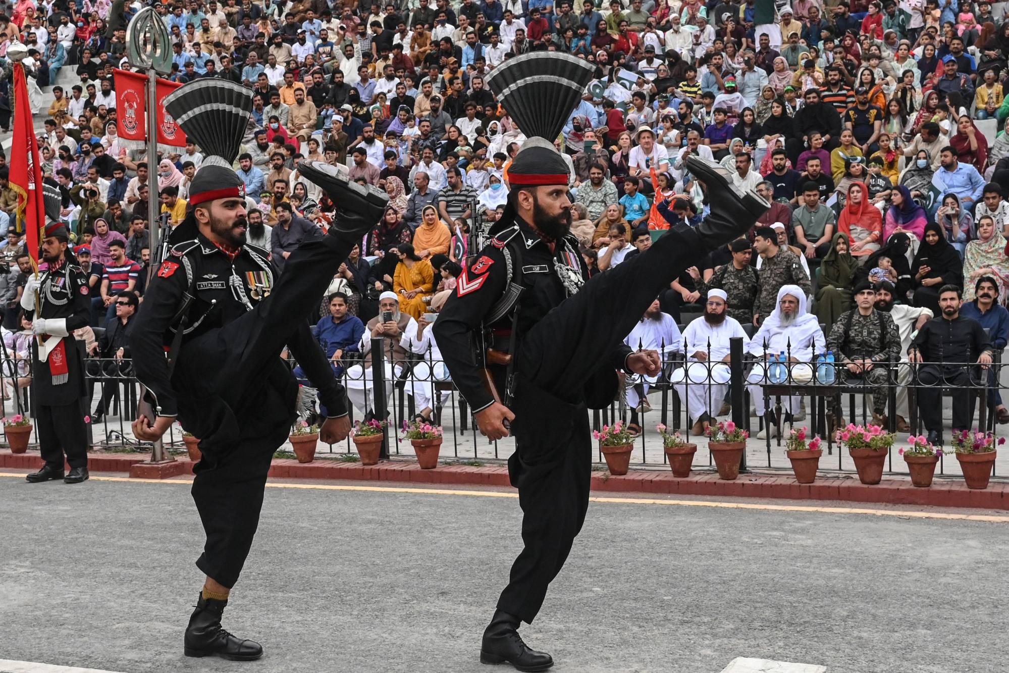 Pakistani Rangers perform during the “Beating Retreat” ceremony at the border gates of Pakistan and India at the Wagah border post near Lahore. Photo: AFP Pakistani Rangers perform during the “Beating Retreat” ceremony at the border gates of Pakistan and India at the Wagah border post near Lahore. Photo: AFP