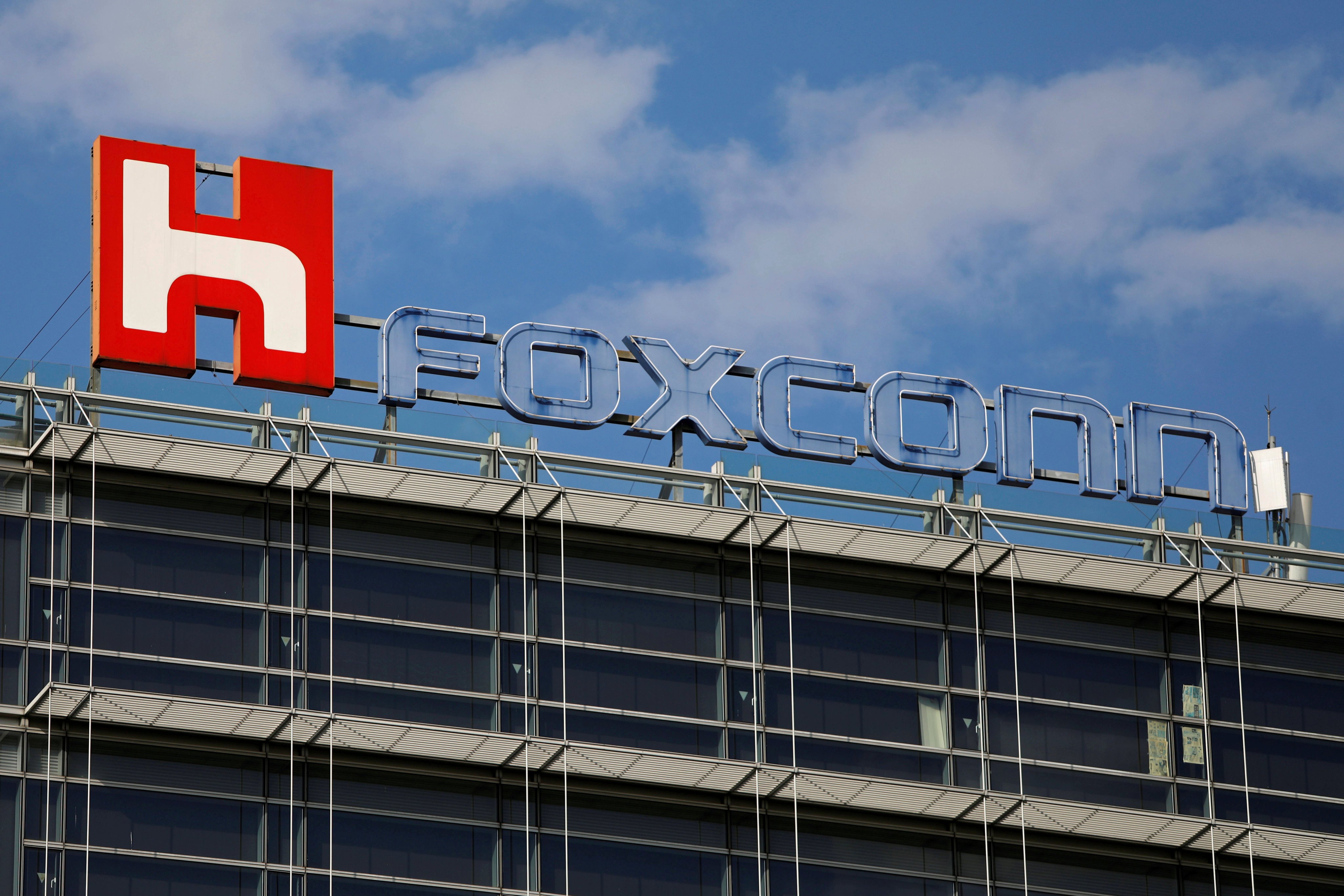 The logo of Foxconn, also known as Hon Hai Precision Industry, is seen on top of the company’s building in Taipei. Photo: Reuters