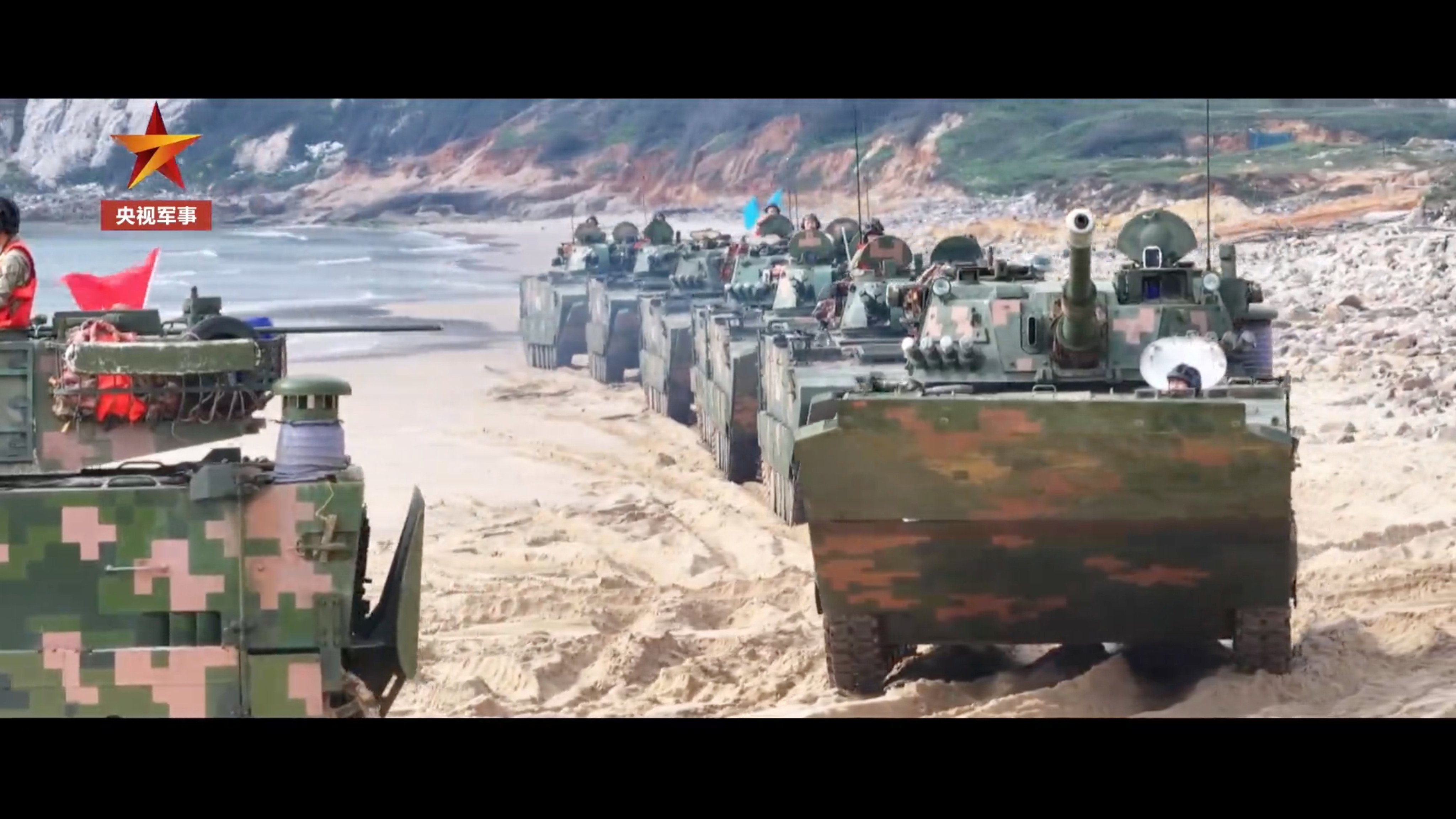 PLA amphibious armoured vehicles on exercise in Fujian province on Tuesday. Photo: CCTV