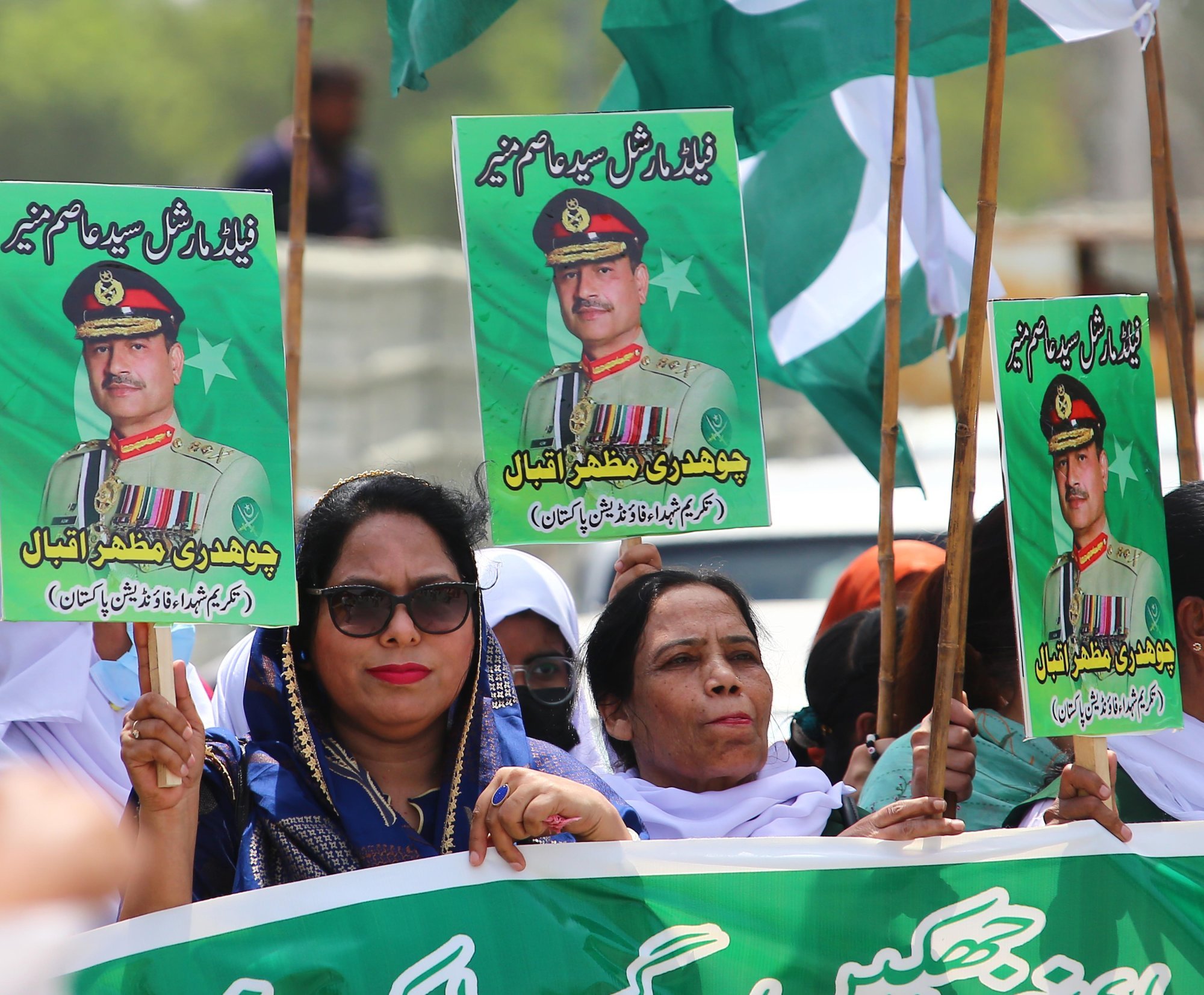 Supporters hold portraits of Pakistani Army Chief General Asim Muneer during a rally to show solidarity with the armed forces in Karachi, Pakistan on Wednesday. Photo: EPA-EFE Supporters hold portraits of Pakistani Army Chief General Asim Muneer during a rally to show solidarity with the armed forces in Karachi, Pakistan on Wednesday. Photo: EPA-EFE