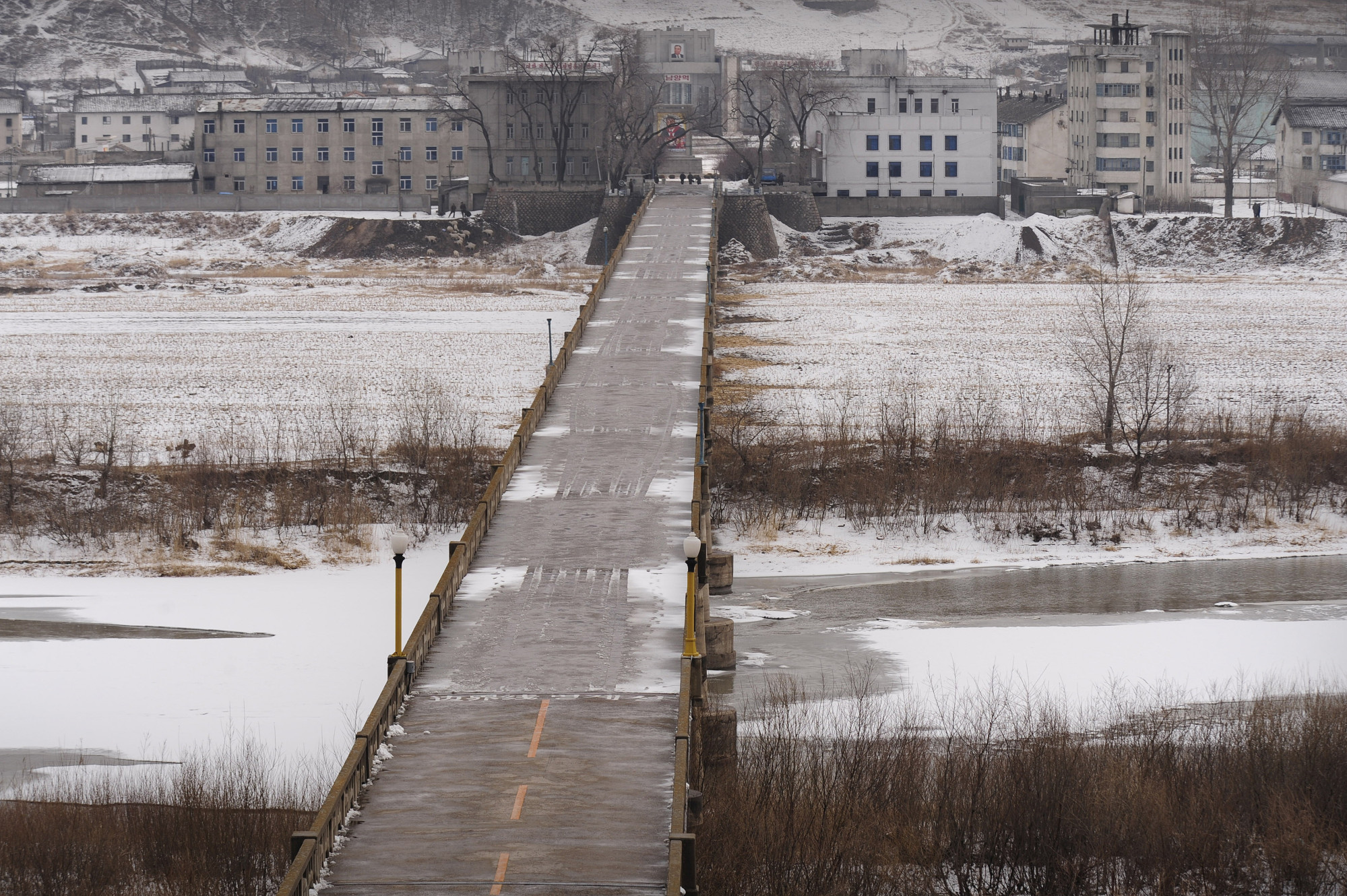 The North Korean town of Namyang is seen from the Chinese town of Tumen in Jilin province across a bridge spanning the Tumen River. Photo: AFP The North Korean town of Namyang is seen from the Chinese town of Tumen in Jilin province across a bridge spanning the Tumen River. Photo: AFP