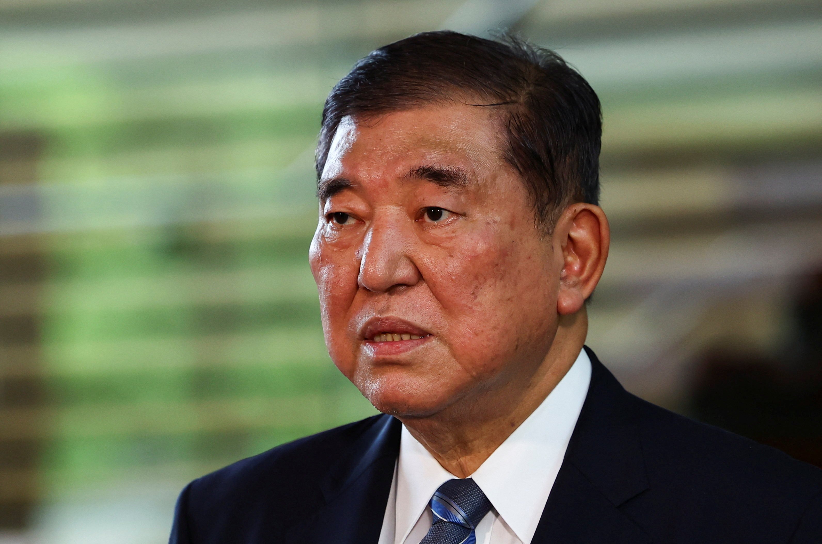 Japan’s Prime Minister Shigeru Ishiba speaks to media after meeting new Agriculture, Forestry and Fisheries Minister Shinjiro Koizumi in Tokyo on Wednesday. Photo: Reuters