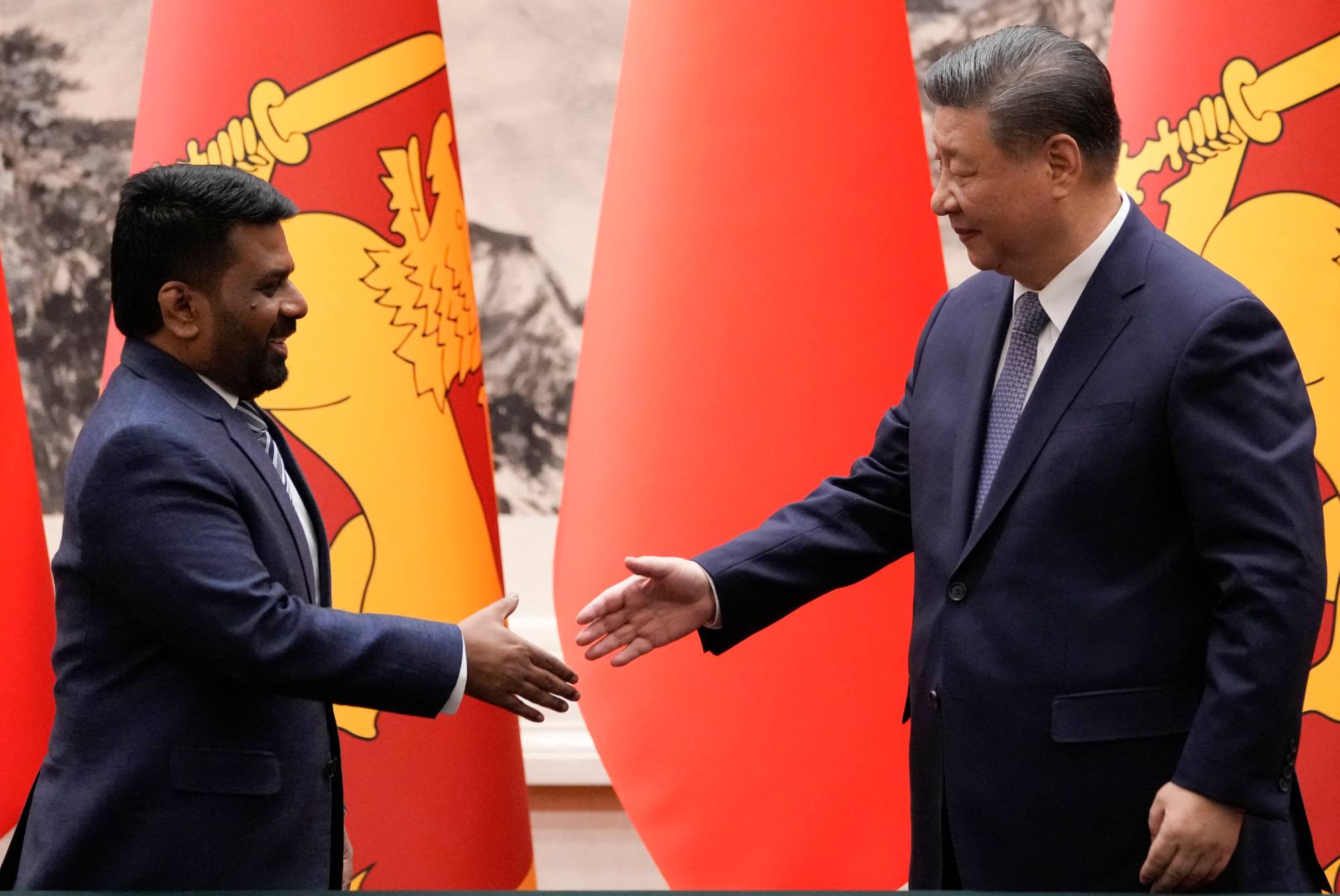 Chinese President Xi Jinping (right) shakes hands with Sri Lankan President Anura Kumara Dissanayake during a signing ceremony at the Great Hall of the People in Beijing on January 15. Photo: AFP Chinese President Xi Jinping (right) shakes hands with Sri Lankan President Anura Kumara Dissanayake during a signing ceremony at the Great Hall of the People in Beijing on January 15. Photo: AFP