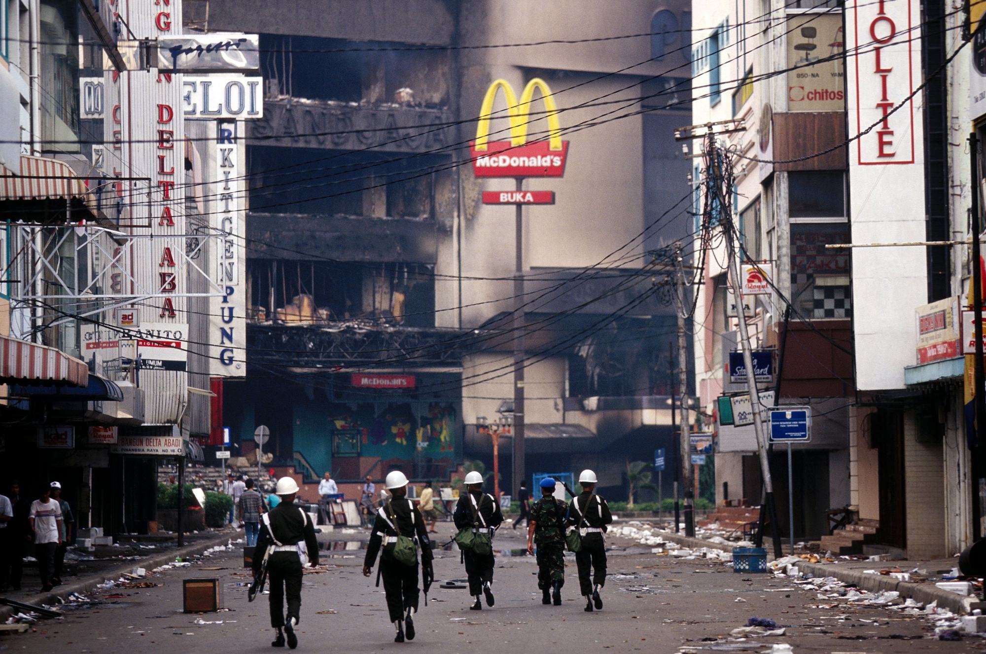 Indonesian police at the scene of riots in Jakarta on May 14, 1998. Photo: Gamma-Rapho via Getty Images Indonesian police at the scene of riots in Jakarta on May 14, 1998. Photo: Gamma-Rapho via Getty Images