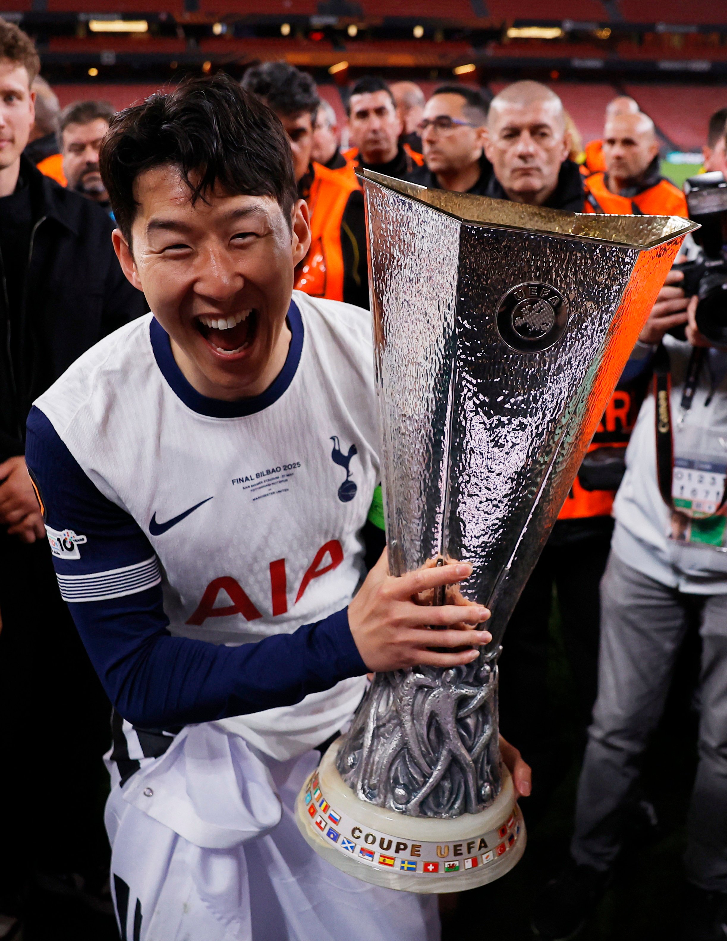 Tottenham Hotspur’s Son Heung-min celebrates with the trophy after winning the Europa League final. Photo: Reuters