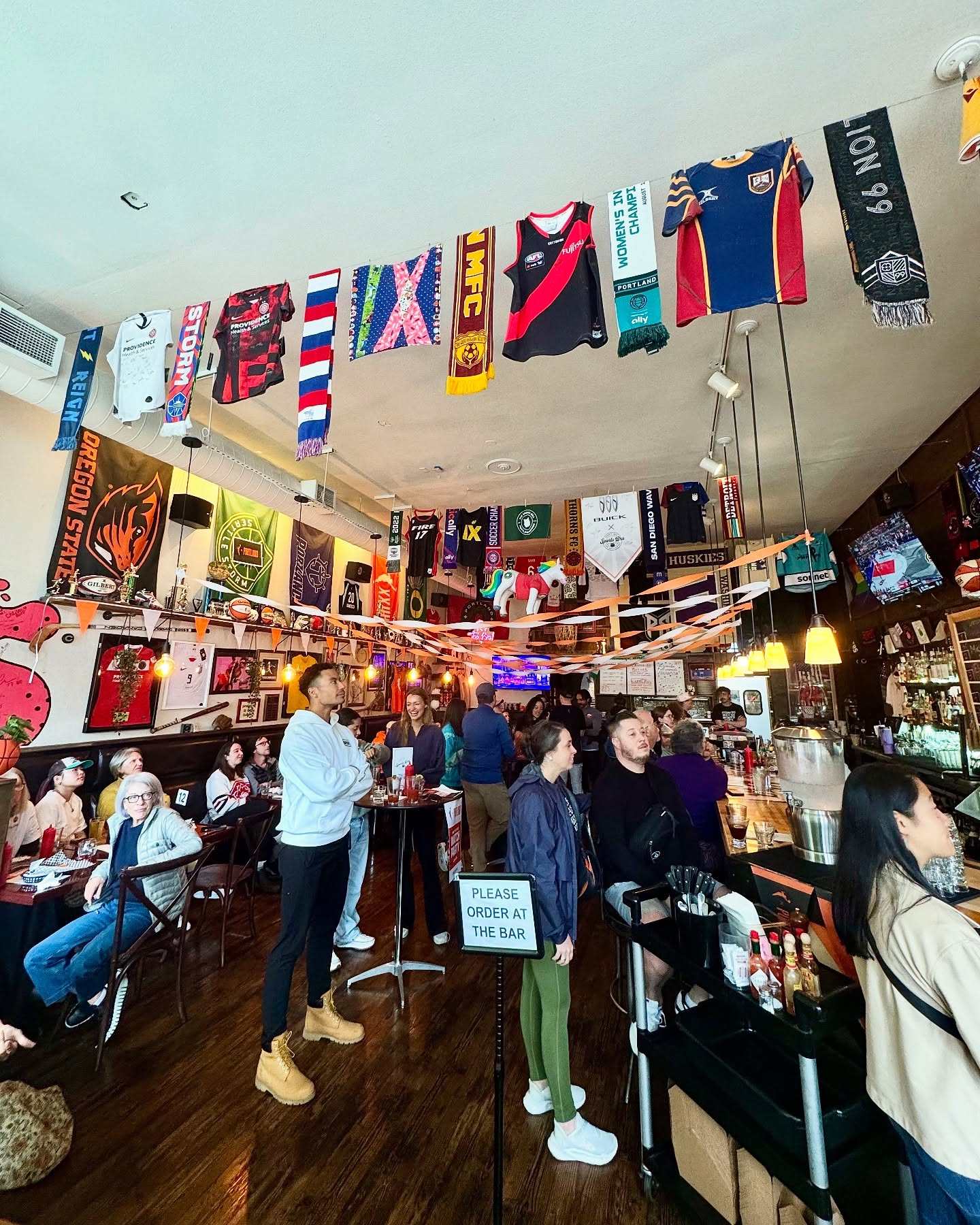 Patrons watch women’s sports at The Sports Bra in Portland, Oregon. Photo: Instagram/wnbaportland