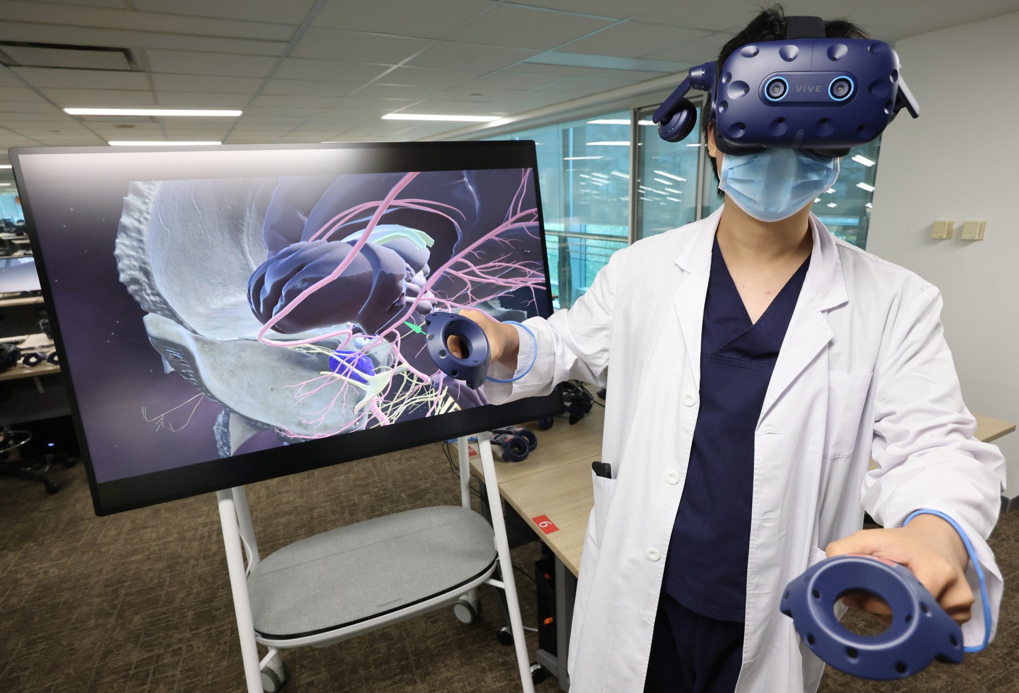 Biomedical students use virtual reality technology at a press briefing to introduce the University of Hong Kong’s updated curriculum, in Pok Fu Lam, on May 24, 2023. Photo: May Tse Biomedical students use virtual reality technology at a press briefing to introduce the University of Hong Kong’s updated curriculum, in Pok Fu Lam, on May 24, 2023. Photo: May Tse