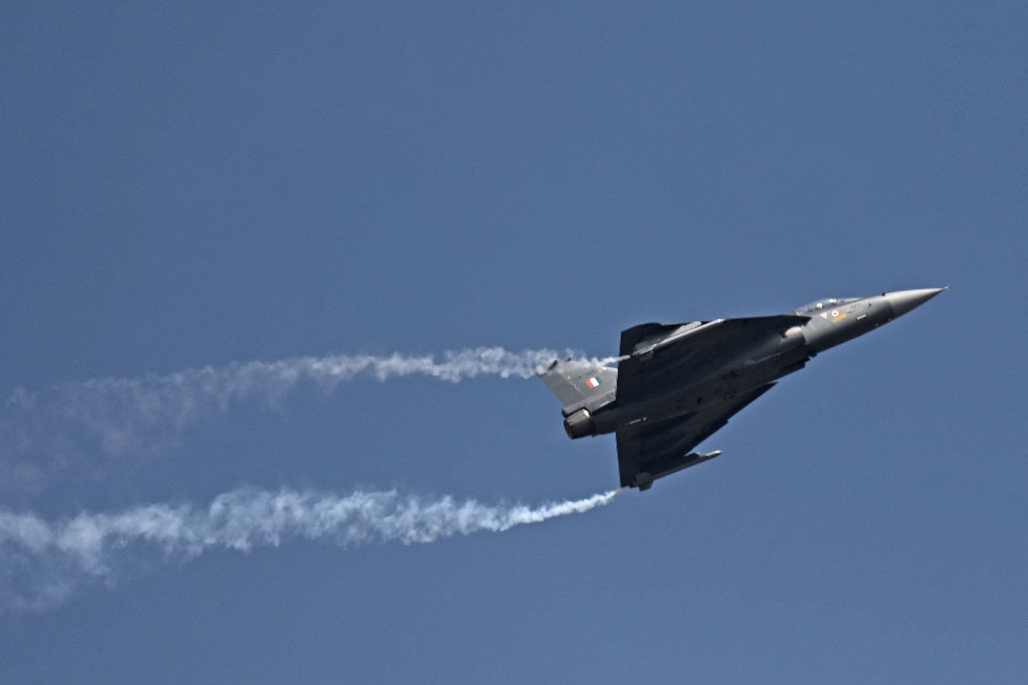 A Tejas fighter jet of the Indian Air Force performs during an air show in Bangalore in 2021. Photo: AFP A Tejas fighter jet of the Indian Air Force performs during an air show in Bangalore in 2021. Photo: AFP