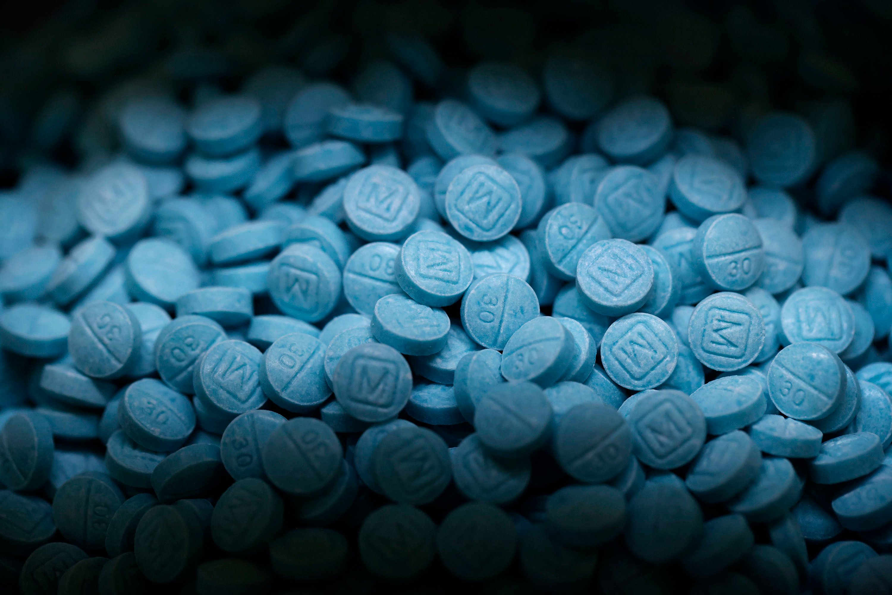 Seized fentanyl pills that resemble oxycodone kept at a US Drug Enforcement Administration lab in Texas. Photo: The Dallas Morning News/TNS