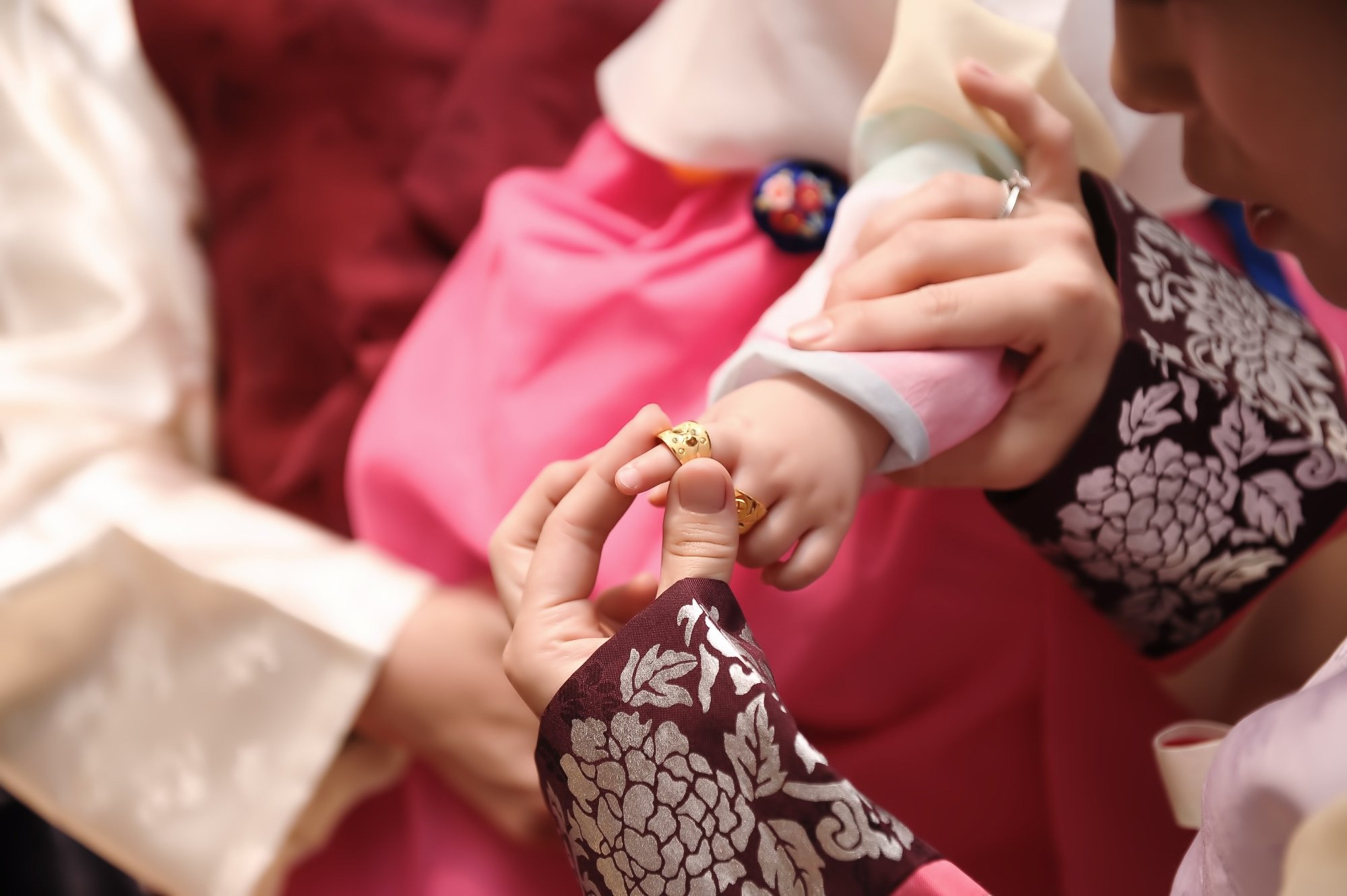 A South Korean baby receives a first-birthday ring. Birth rates are low across the country. Photo: Shutterstock A South Korean baby receives a first-birthday ring. Birth rates are low across the country. Photo: Shutterstock