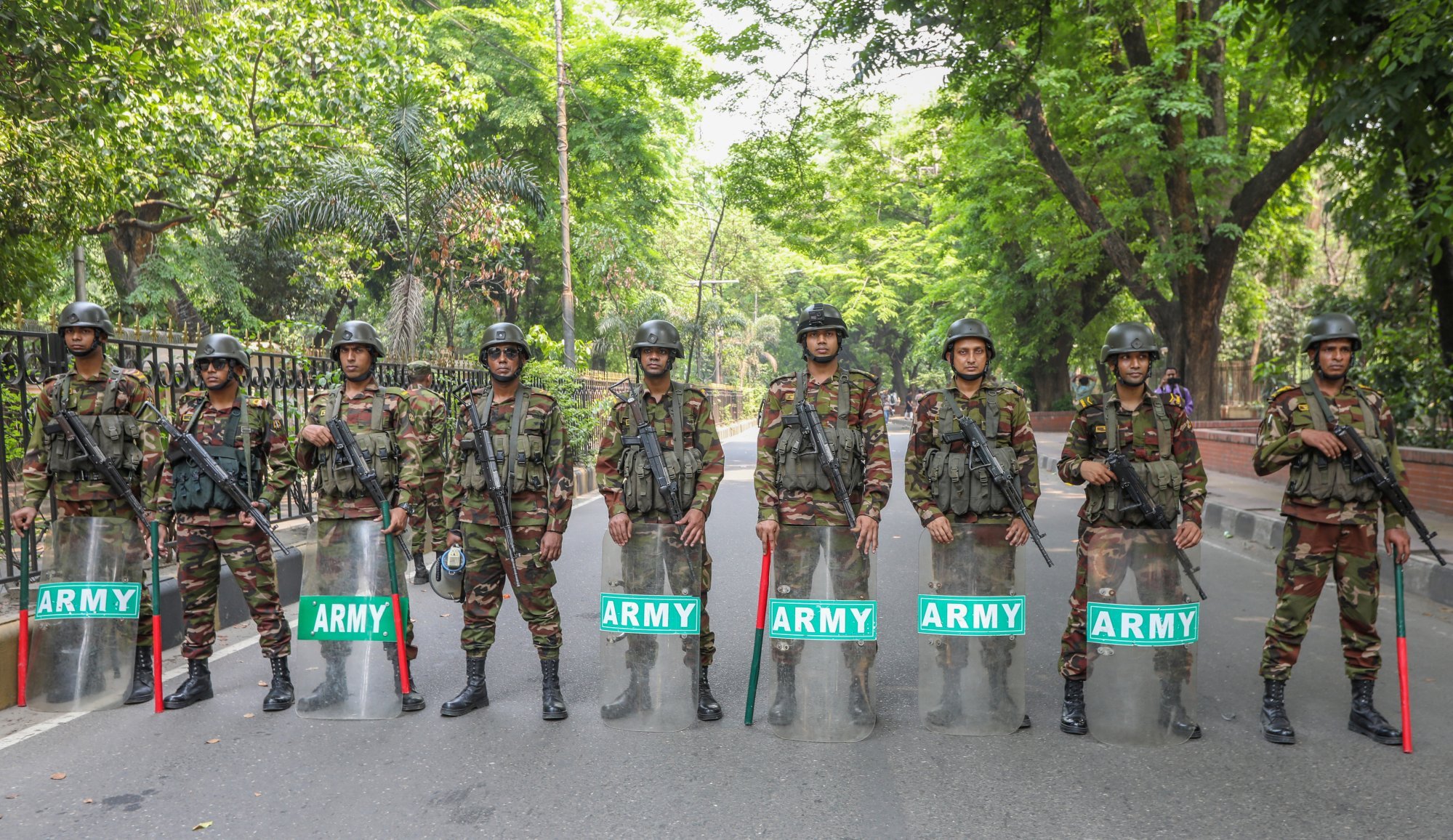 Bangladesh army personal stand guard in front of Bangladesh Chief adviser Yunus’s official residence, as members of the National Citizen Party (NCP) demonstrate, on May 9. Photo: EPA-EFE Bangladesh army personal stand guard in front of Bangladesh Chief adviser Yunus’s official residence, as members of the National Citizen Party (NCP) demonstrate, on May 9. Photo: EPA-EFE