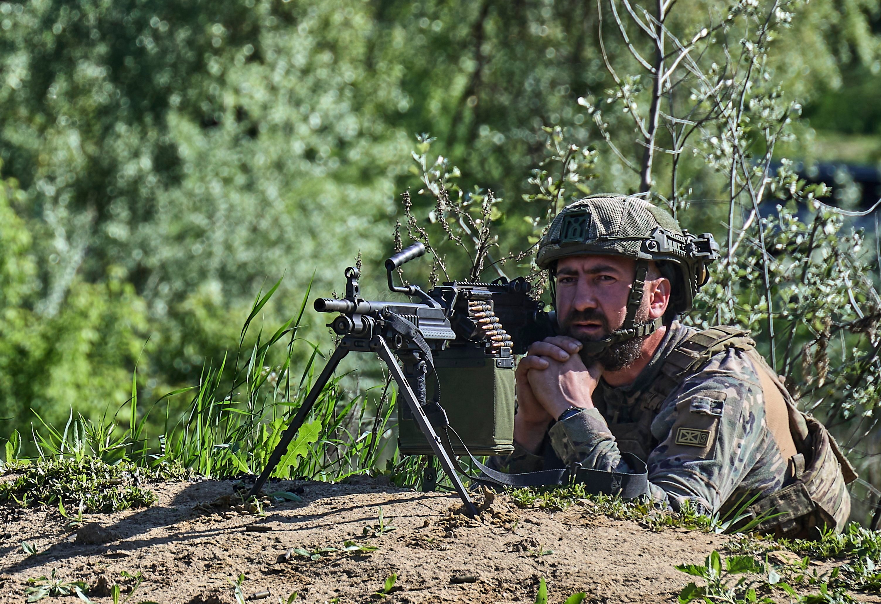 A serviceman attends training at a shooting range in Ukraine’s Kharkiv on May 24. Photo: EPA-EFE