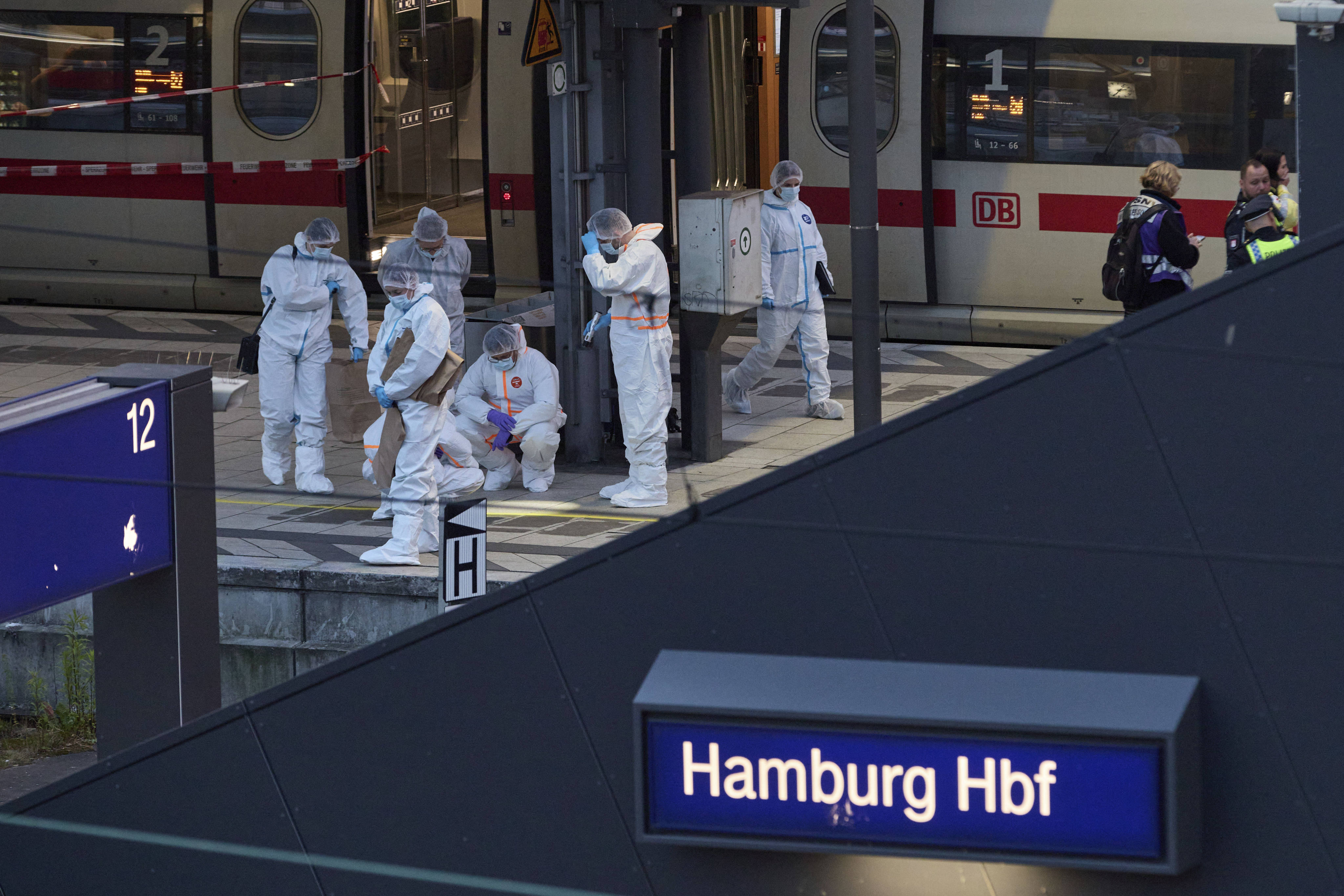 Police and forensics work near the crime scene after a stabbing attack at Hamburg Central Station in Germany on Friday. Photo: dpa via AP