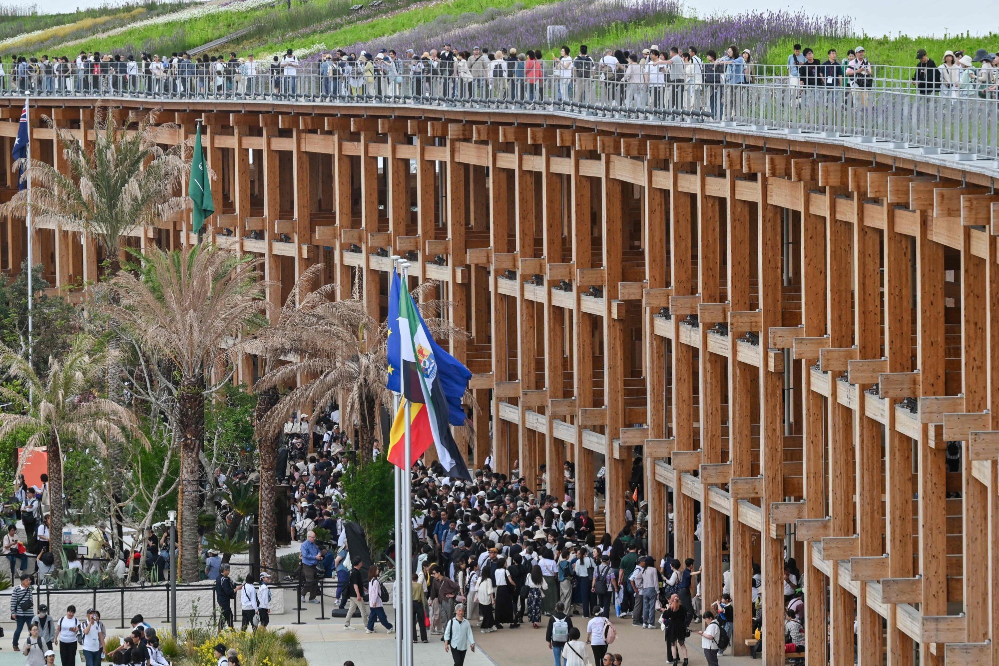 Crowds queue up for events at various pavilions on the Grand Ring during the 2025 Osaka Expo on Wednesday. Photo: AFP Crowds queue up for events at various pavilions on the Grand Ring during the 2025 Osaka Expo on Wednesday. Photo: AFP