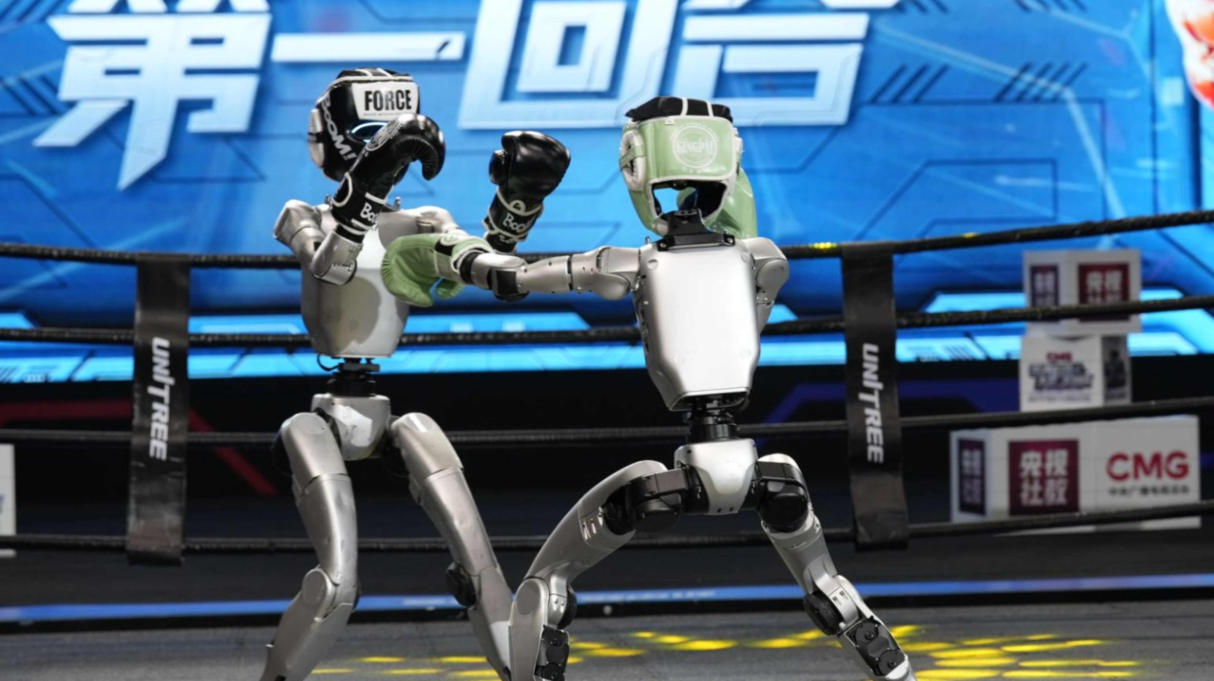 Unitree Robotics’ G1 humanoid robots square off at a kickboxing tournament in Hangzhou on Sunday. Photo: Handout