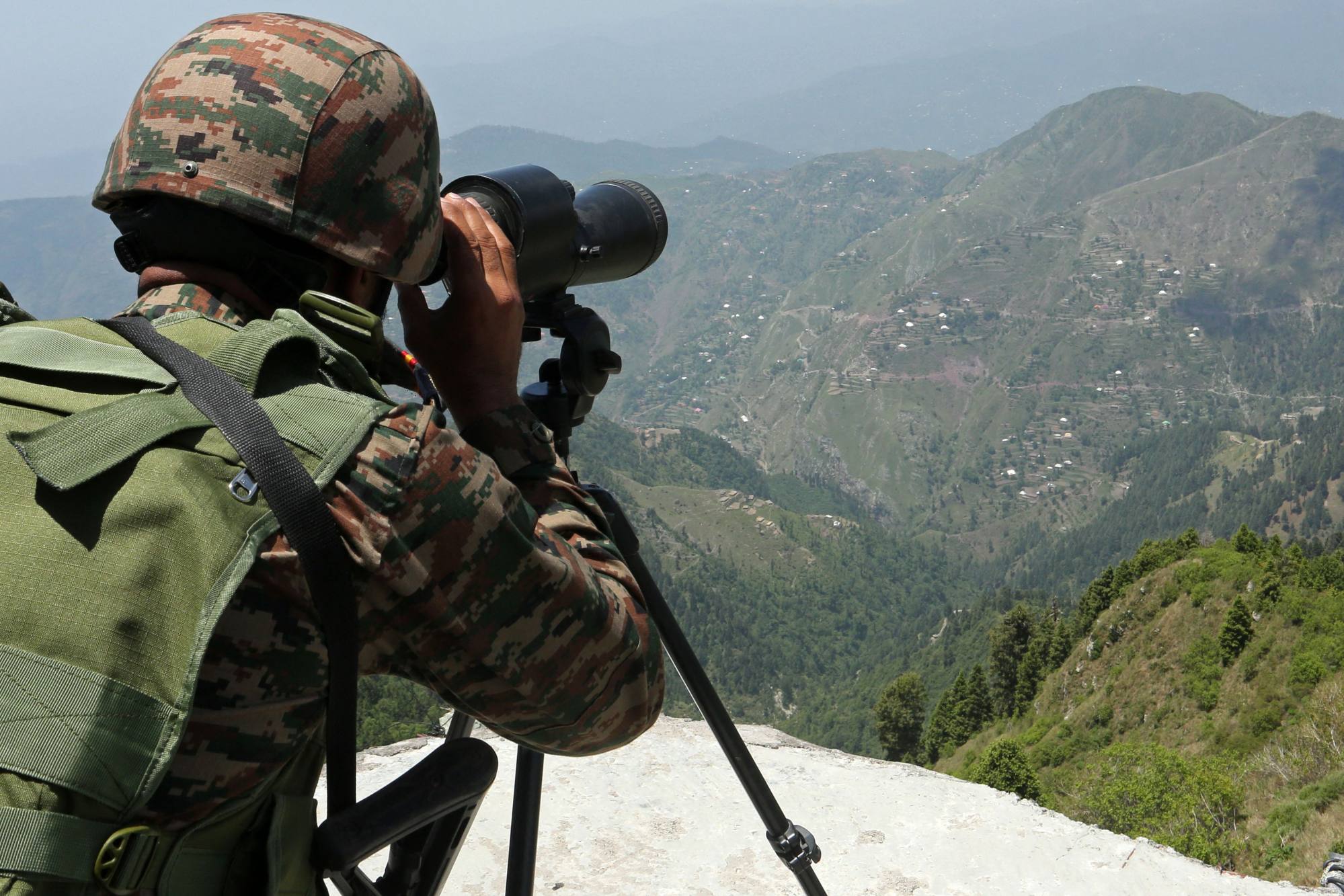 An Indian soldier keeps watch near the Line of Control separating Pakistan and India on Tuesday. Photo: AFP An Indian soldier keeps watch near the Line of Control separating Pakistan and India on Tuesday. Photo: AFP