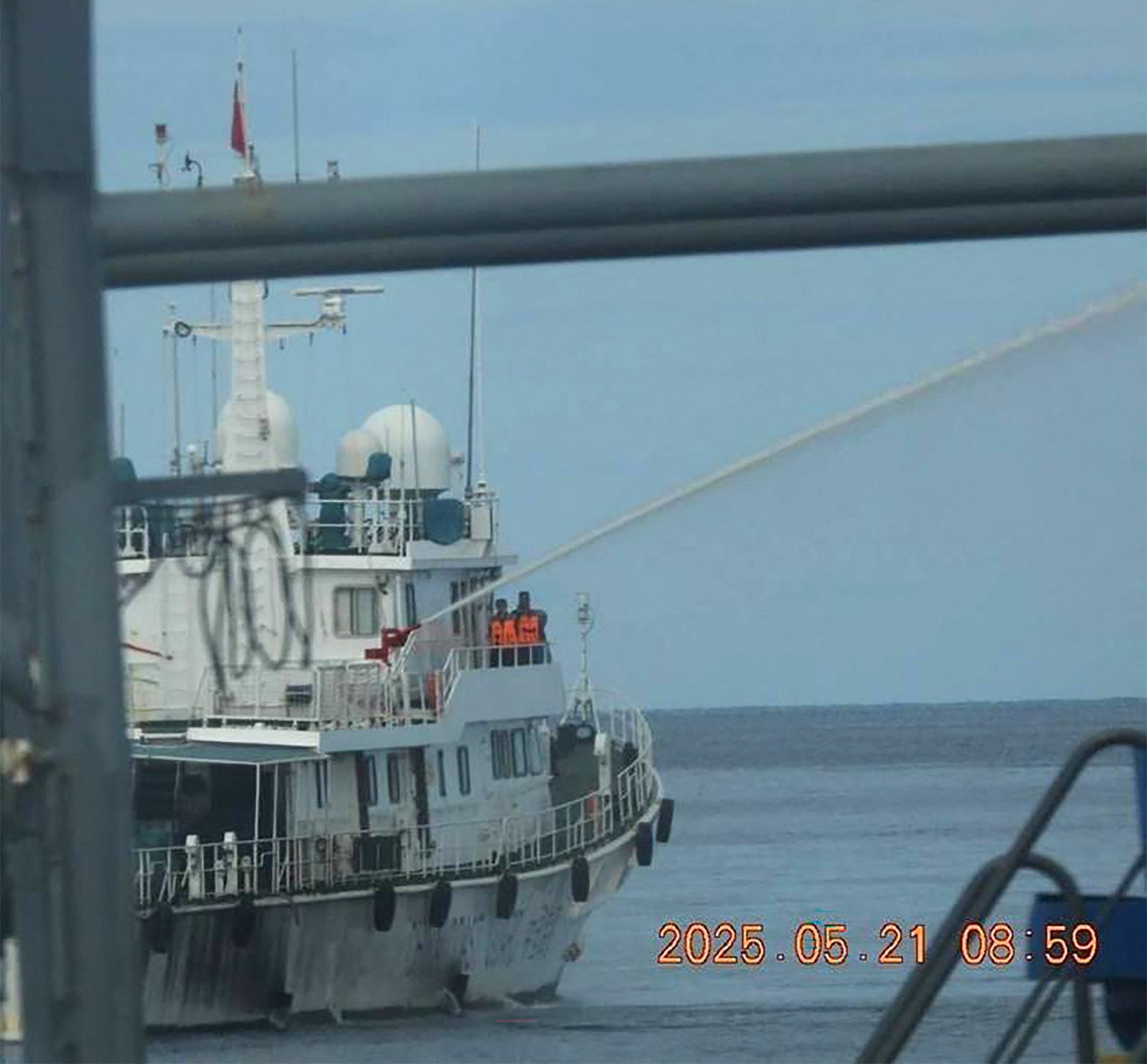 A China Coast Guard ship (left) deploys a water cannon against a Bureau of Fisheries and Aquatic Resources ship near Sandy Cay reef in the disputed South China Sea on Wednesday. Photo: Bureau of Fisheries and Aquatic Resources/Philippine Coast Guard/AFP A China Coast Guard ship (left) deploys a water cannon against a Bureau of Fisheries and Aquatic Resources ship near Sandy Cay reef in the disputed South China Sea on Wednesday. Photo: Bureau of Fisheries and Aquatic Resources/Philippine Coast Guard/AFP