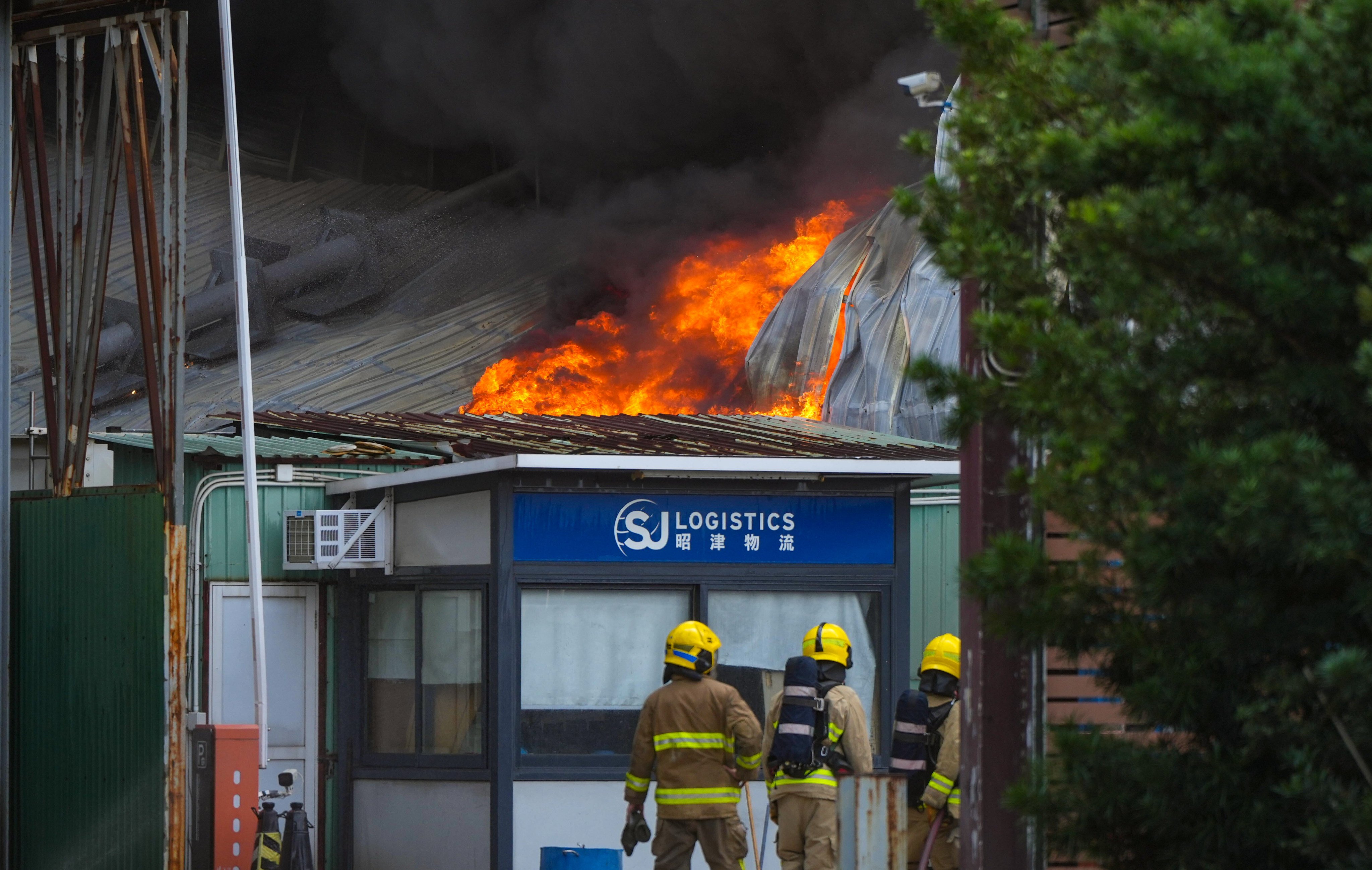 Firefighters are battling a No 3 alarm fire at a Hong Kong warehouse. Photo: Sam Tsang