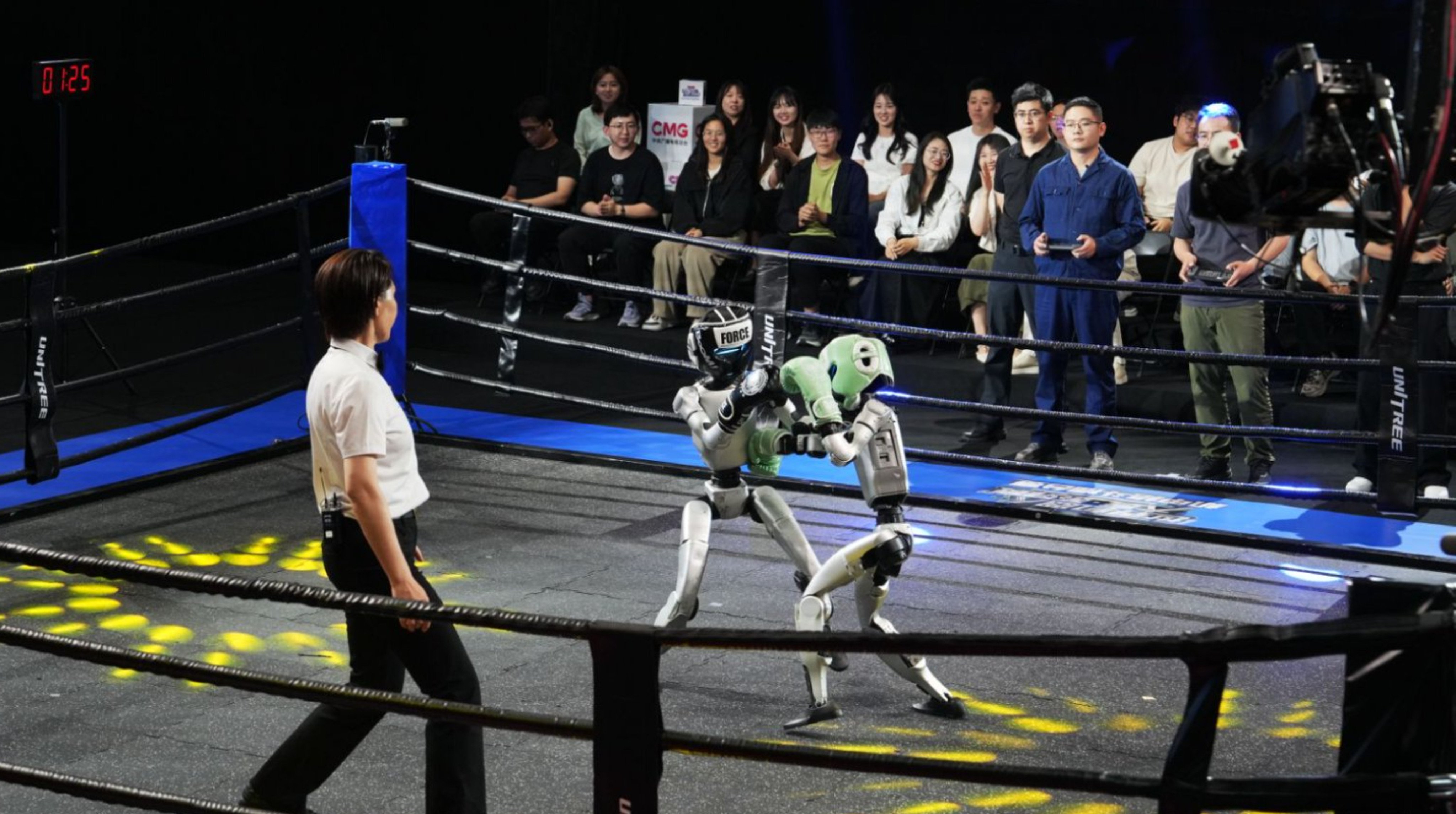 Humanoid robots square off in a fight on Sunday in Hangzhou. Photo: handout