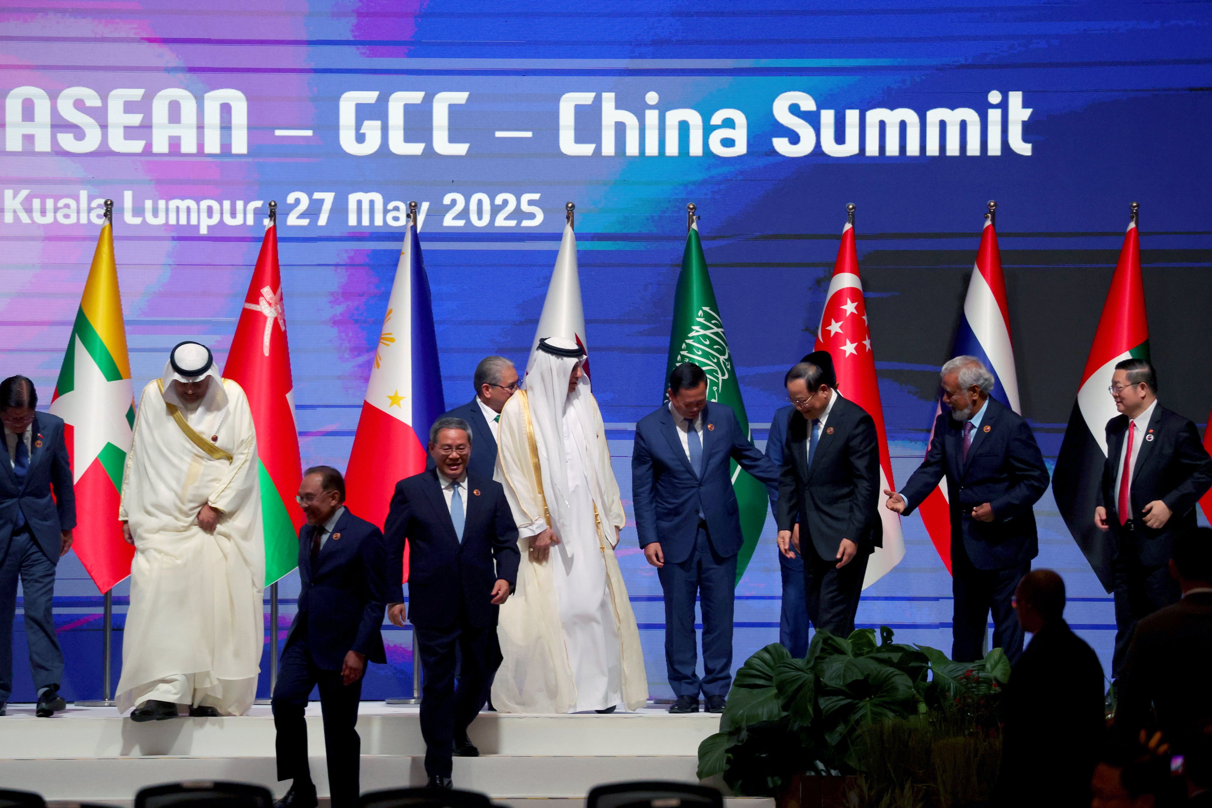 Chinese Premier Li Qiang, Malaysian Prime Minister Anwar Ibrahim and other leaders leave the stage after posing for a family photo ahead of the Asean-GCC-China summit, in Kuala Lumpur on May 27. Photo: EPA-EFE