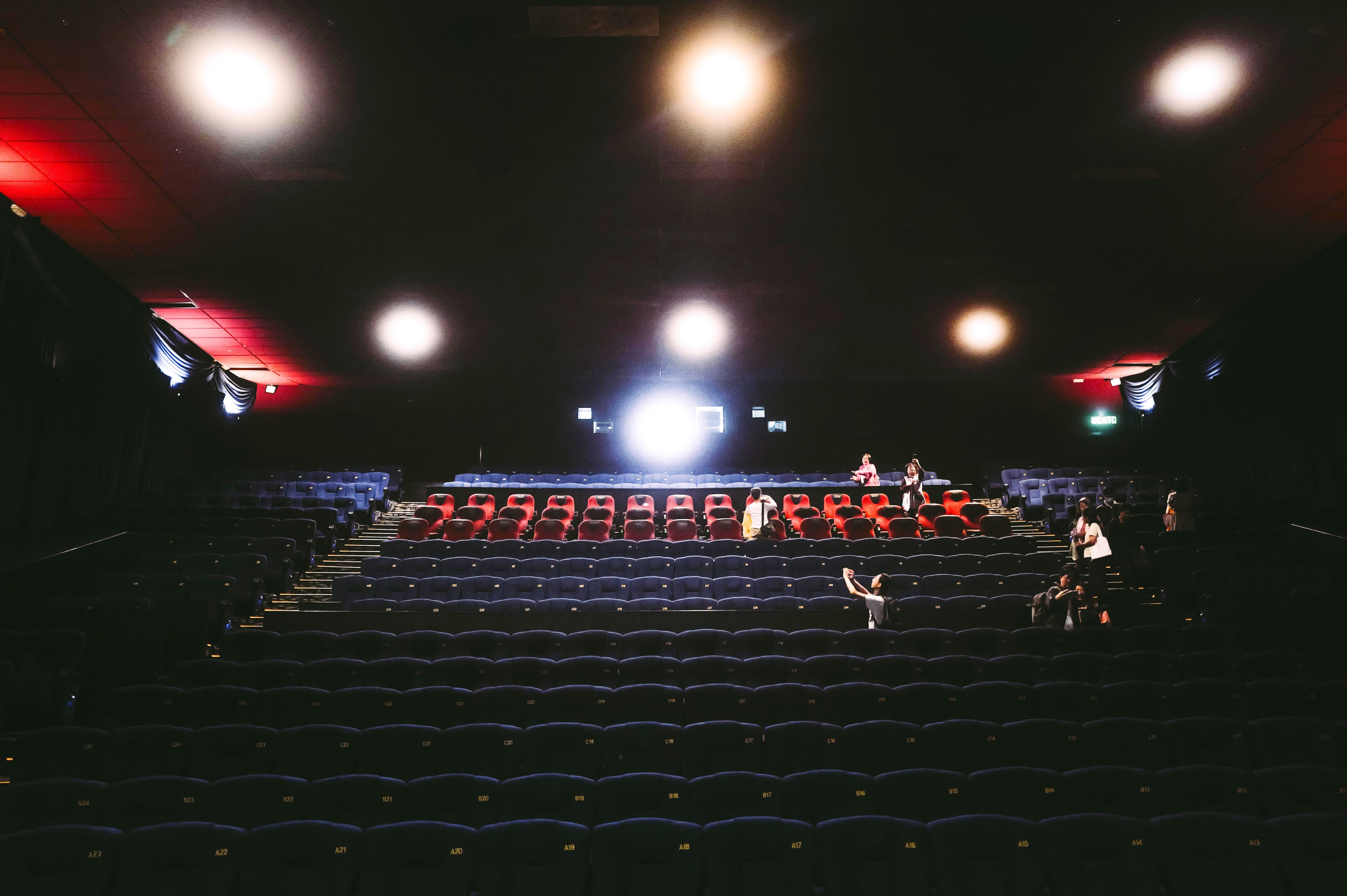 People take photos in the interior of Grand Ocean Cinema. Photo: Elson Li