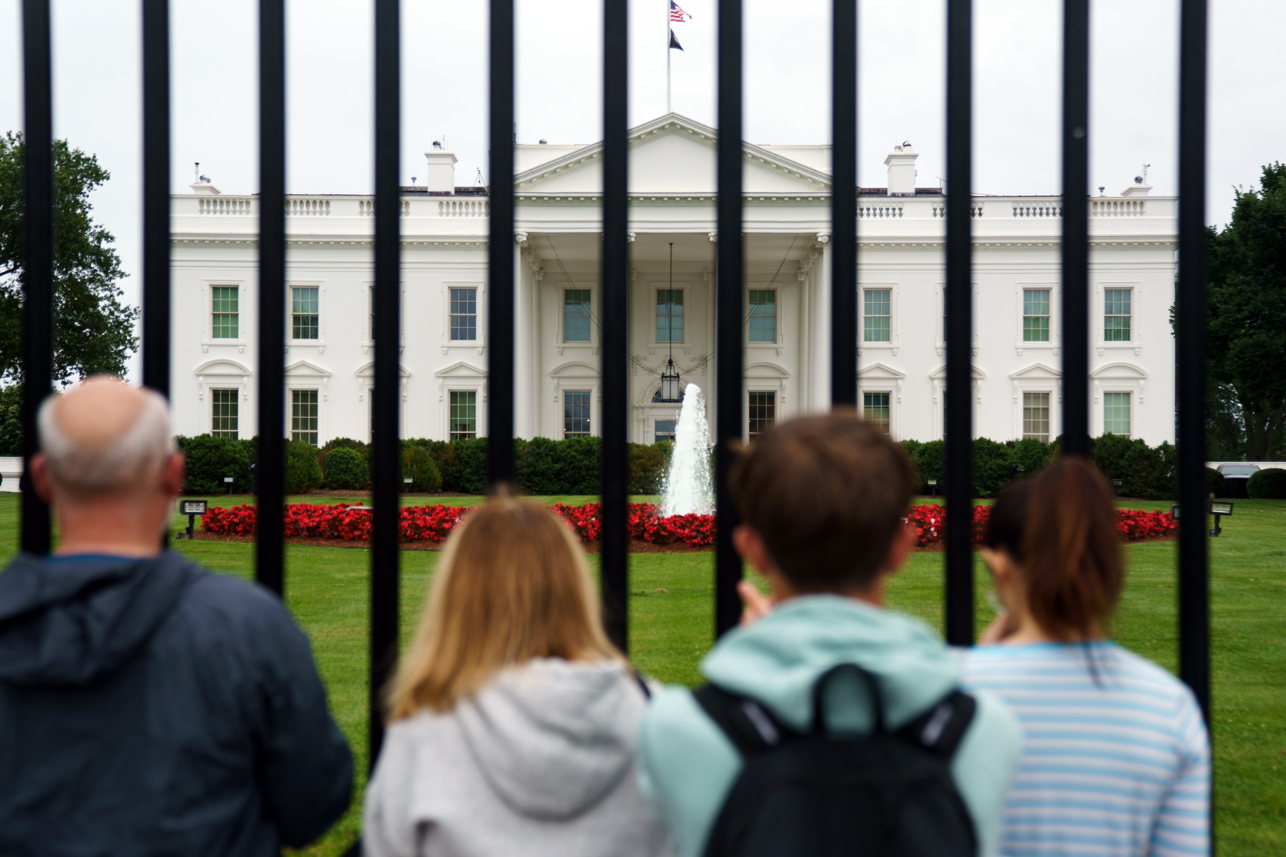 Tourists outside the White House. The administration of US President Donald Trump – himself a prolific and often confrontational social media user – has also sharply criticised allies Germany and Britain for restricting what the governments term hate speech. Photo: EPA-EFE