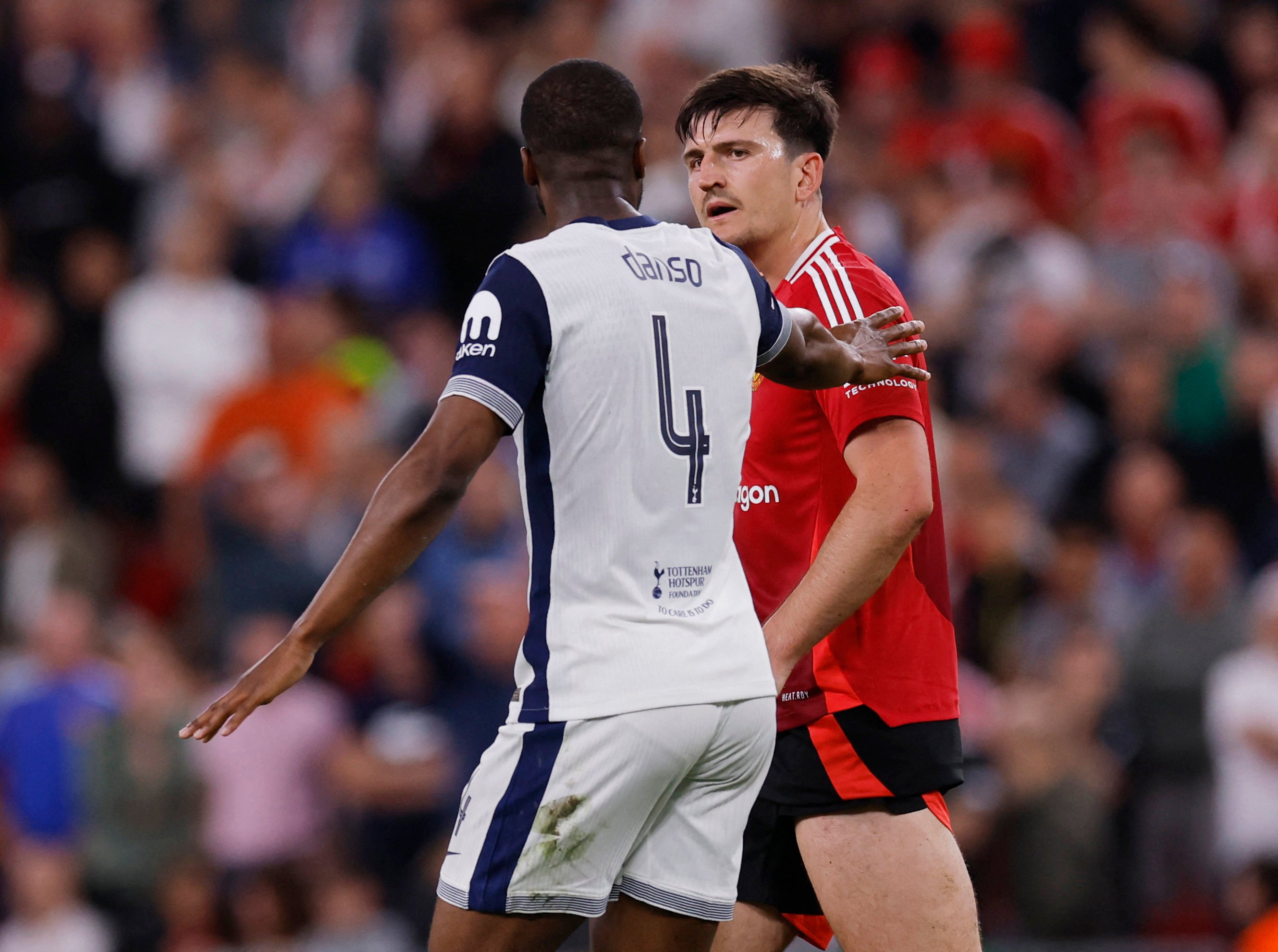 Harry Maguire takes issue with Tottenham Hotspur defender Kevin Danso during last week’s Europa League final. Photo: Reuters