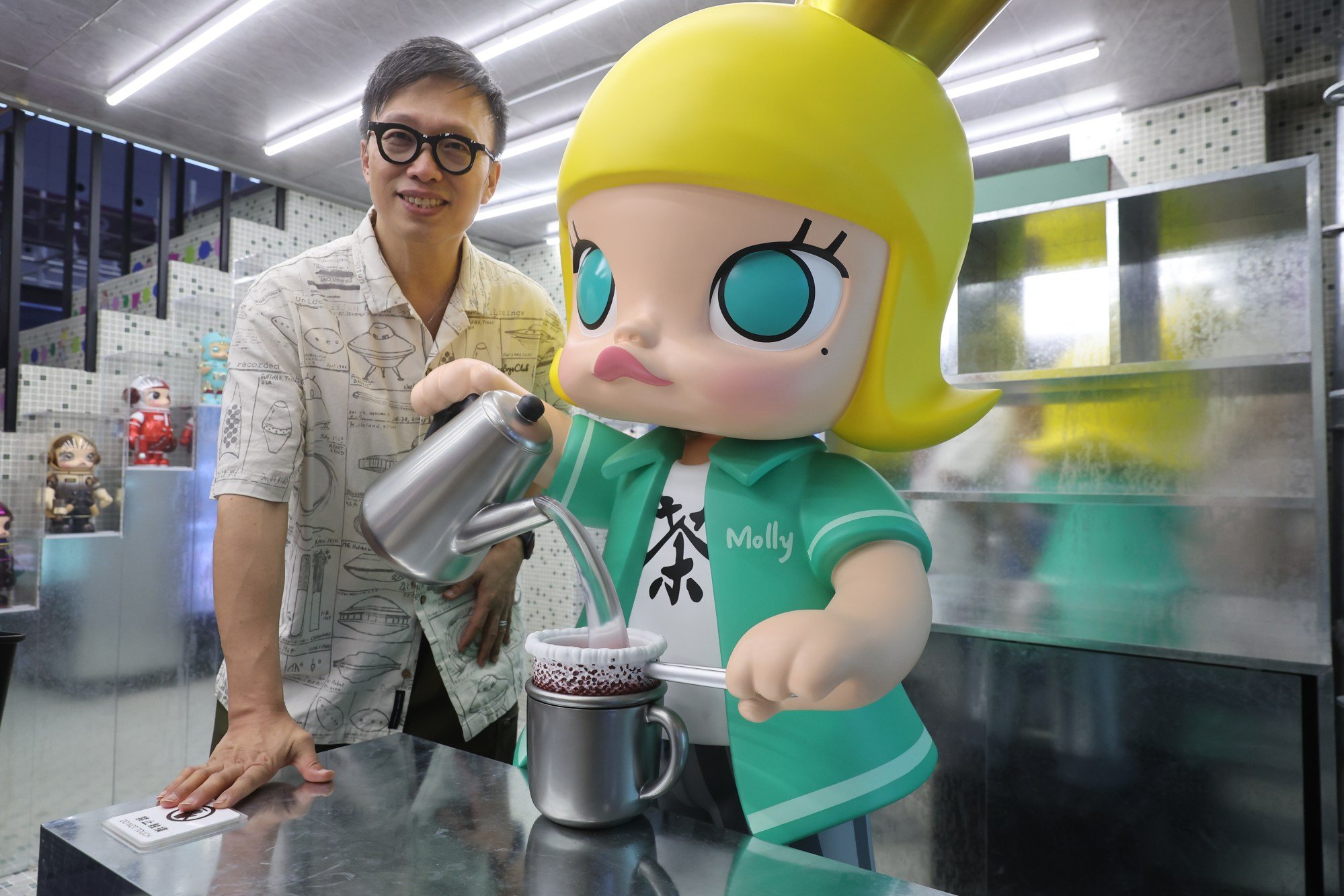 Hongkonger Kenny Wong with Molly at a recent trade fair in Shenzhen. Photo: Edmond So Hongkonger Kenny Wong with Molly at a recent trade fair in Shenzhen. Photo: Edmond So