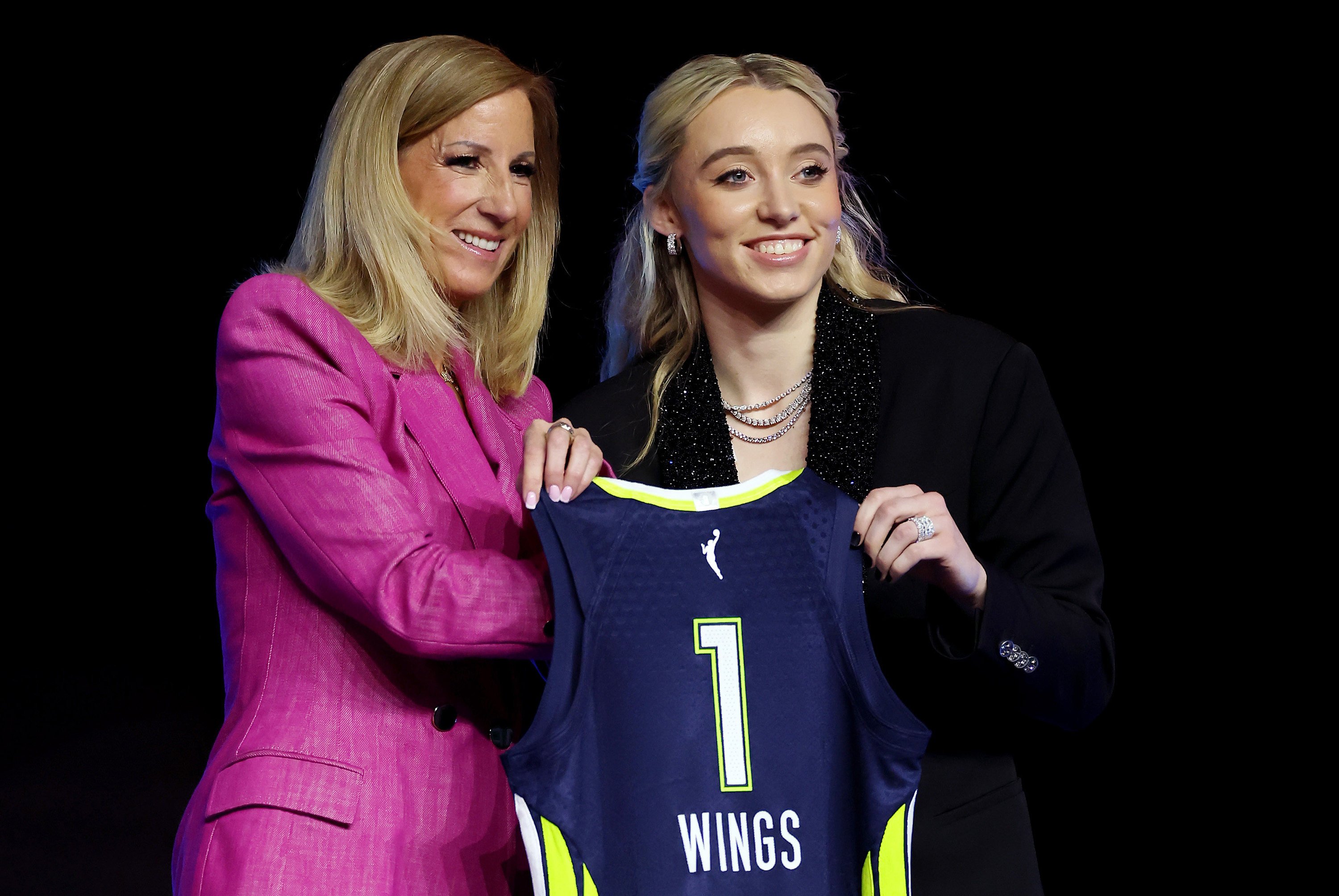 Paige Bueckers with WNBA Commissioner Cathy Engelbert after being selected with the first overall pick by the Dallas Wings during the 2025 WNBA Draft in New York in April. Photo: Getty Images via TNS