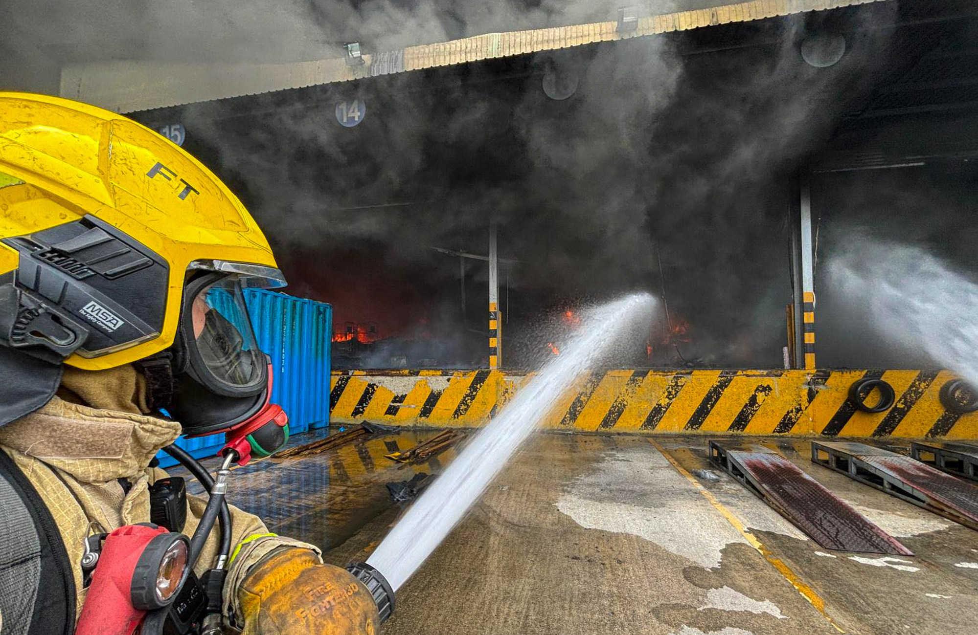The fire at the warehouse in Tin Shui Wai broke out at around 12.40pm on Tuesday. Photo: Handout The fire at the warehouse in Tin Shui Wai broke out at around 12.40pm on Tuesday. Photo: Handout