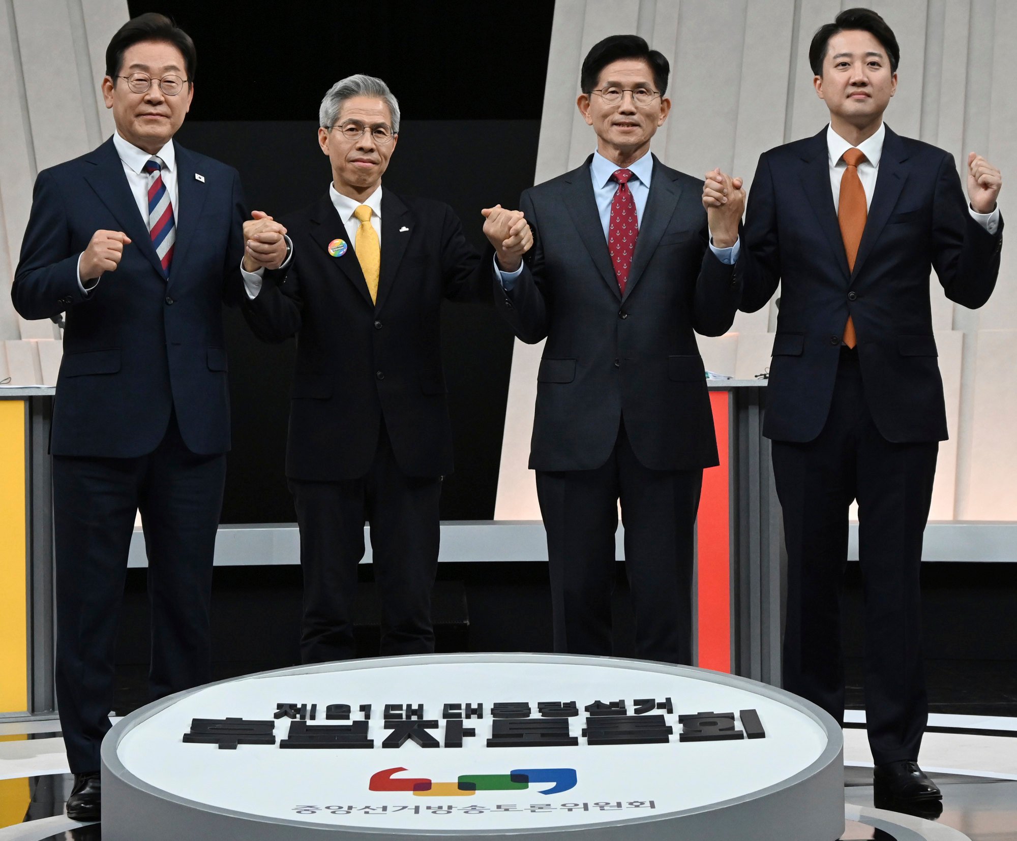 South Korea’s presidential candidates (from left) Lee Jae-myung, Kwon Young-guk, Kim Moon Soo and Lee Jun-seok ahead of the third televised presidential debate on Tuesday. Photo: Kyodo/AP South Korea’s presidential candidates (from left) Lee Jae-myung, Kwon Young-guk, Kim Moon Soo and Lee Jun-seok ahead of the third televised presidential debate on Tuesday. Photo: Kyodo/AP