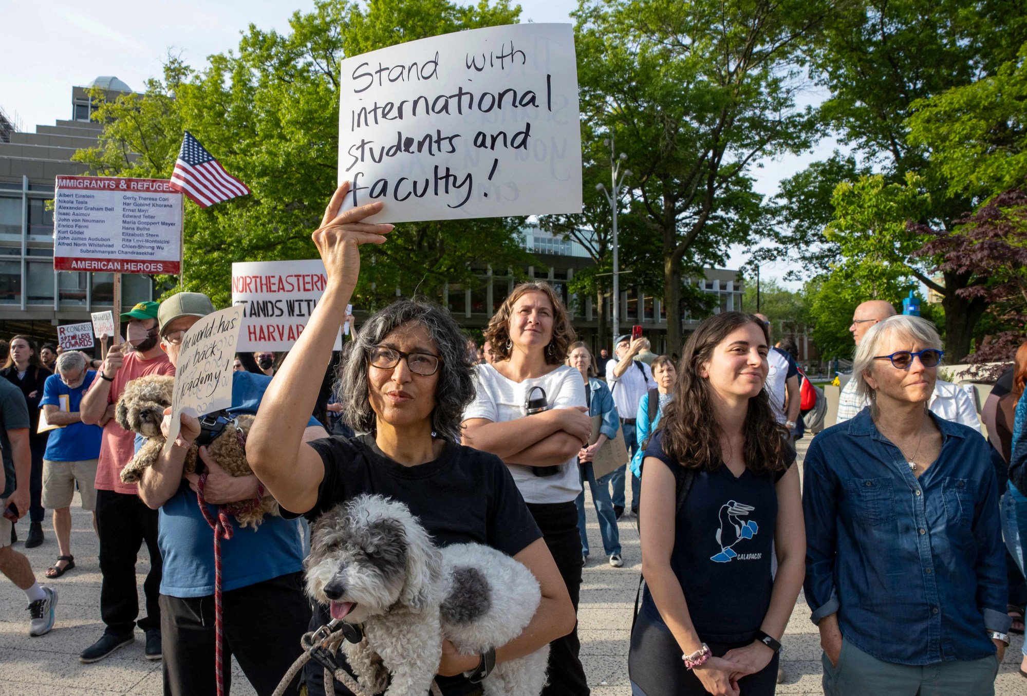 People hold up signs during the Harvard Students for Freedom rally in support of international students at the Harvard University campus in Boston, Massachusetts, on Tuesday. Photo: AFP People hold up signs during the Harvard Students for Freedom rally in support of international students at the Harvard University campus in Boston, Massachusetts, on Tuesday. Photo: AFP