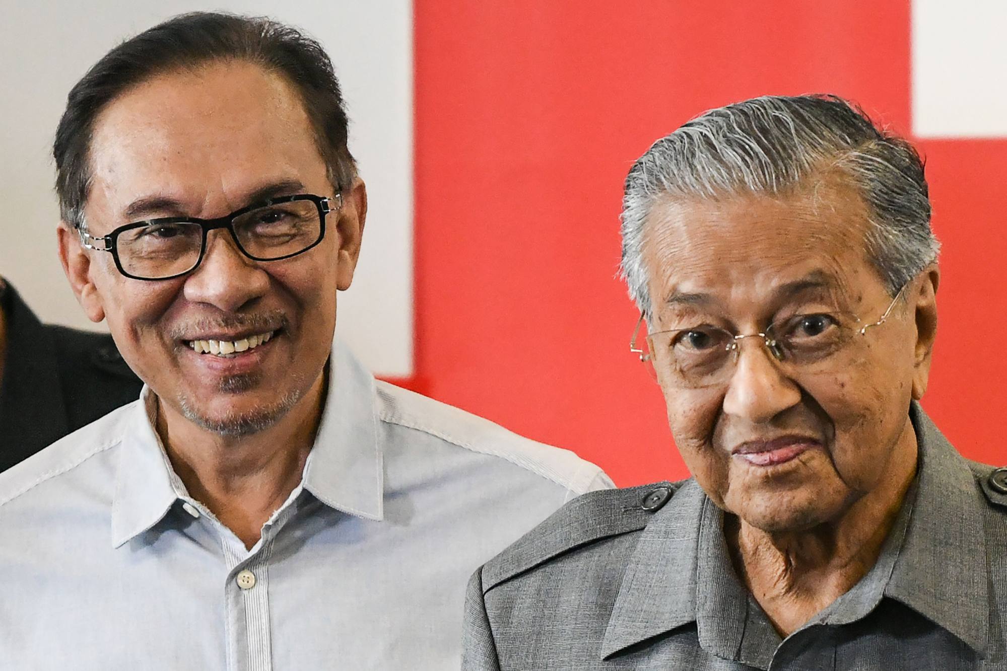 The resignation of two Malaysian cabinet ministers is reminiscent of Anwar’s own split with his former mentor Mahathir Mohamad in 1998. Photo: AFP