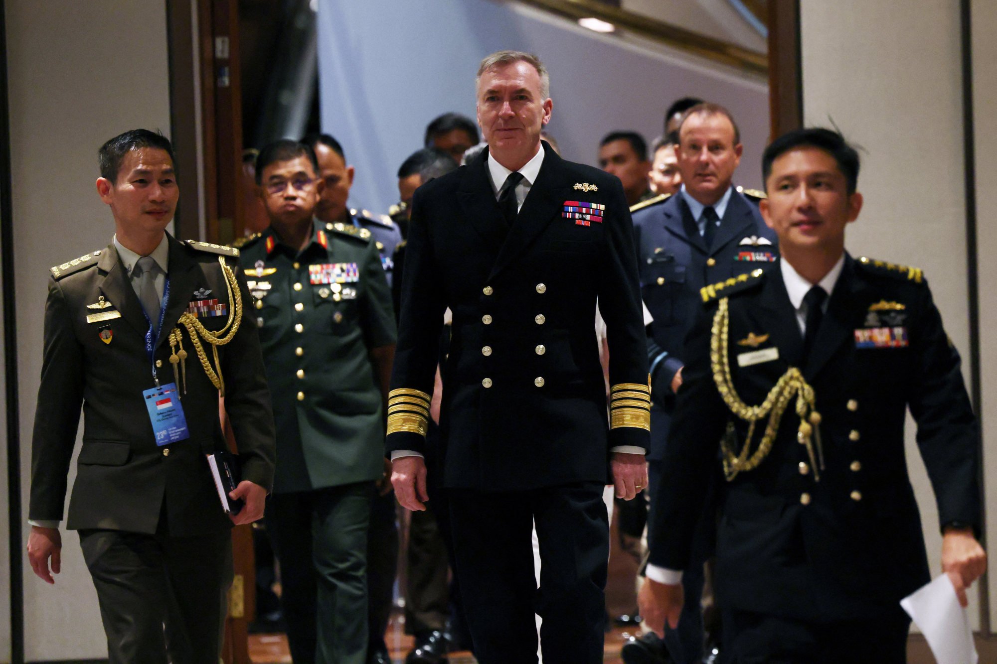 Britain’s Chief of the Defence Staff Admiral Tony Radakin (centre) arrives at the Five Power Defence Arrangements Defence Chiefs’ Conference in Singapore on Thursday. Photo: Reuters Britain’s Chief of the Defence Staff Admiral Tony Radakin (centre) arrives at the Five Power Defence Arrangements Defence Chiefs’ Conference in Singapore on Thursday. Photo: Reuters