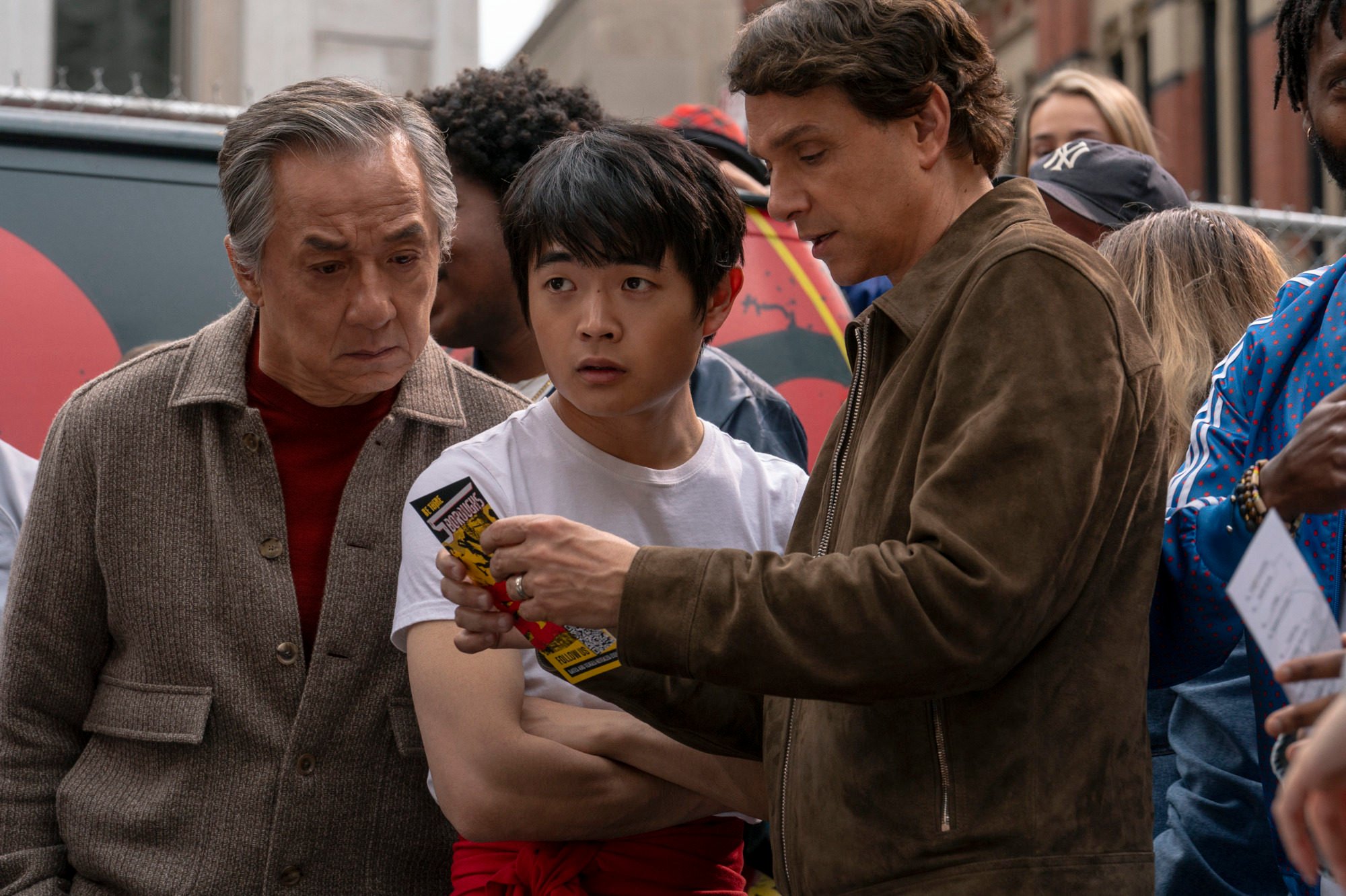 (From left) Jackie Chan, Ben Wang and Ralph Macchio in a still from Karate Kid: Legends, directed by Jonathan Entwistle. Photo: Jonathan Wenk