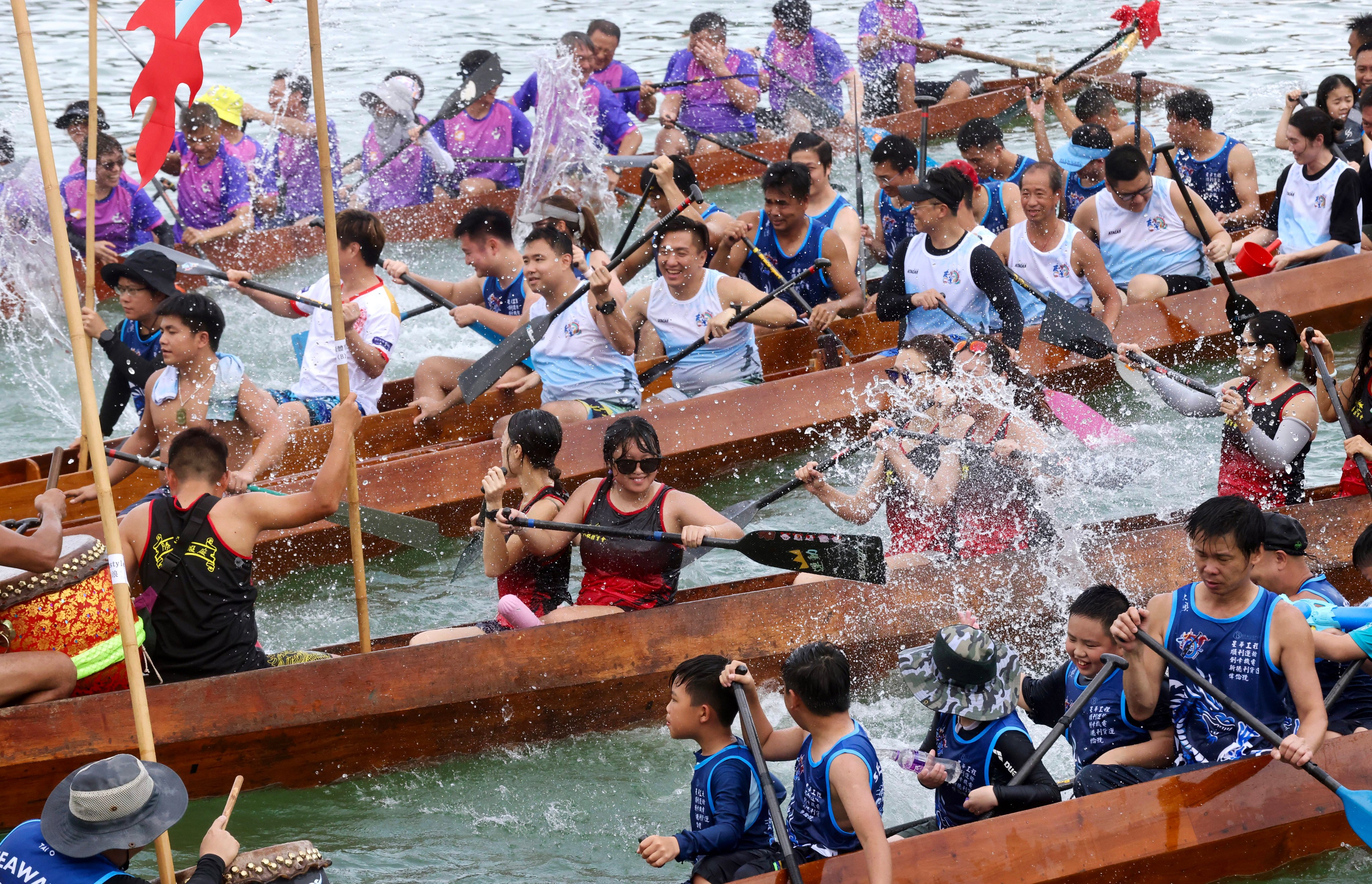 Locals and tourists are expected to head out to the races being held in Stanley, Aberdeen, Tsim Sha Tsui East and Sha Tin on Saturday. Photo: Jonathan Wong