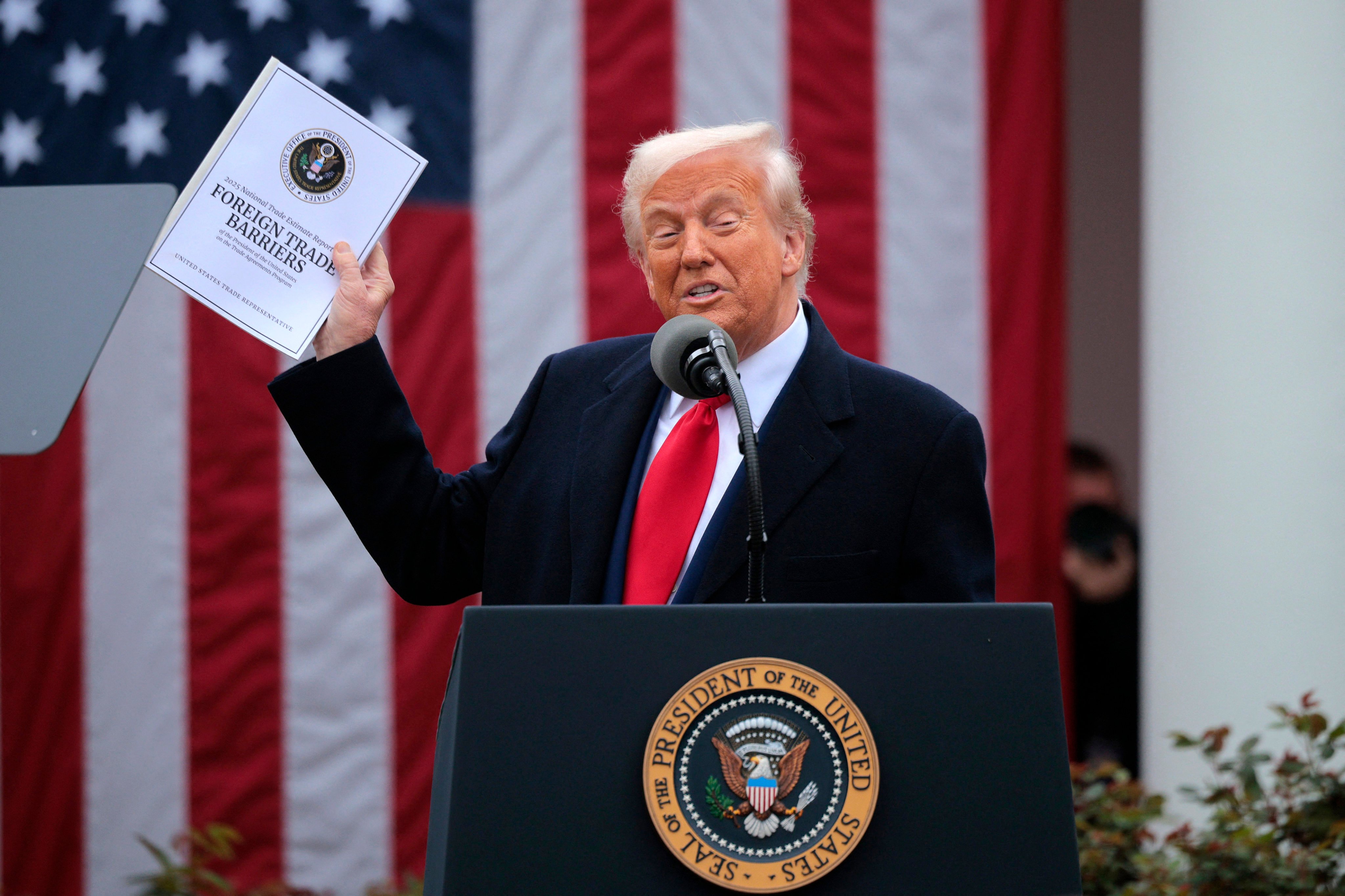 US President Donald Trump announces sweeping so-called “reciprocal” tariffs on dozens of countries in Washington on April 2. A US court order has now blocked the duties, after judges ruled that the president overstepped his authority in imposing the tariffs. Photo: AFP
