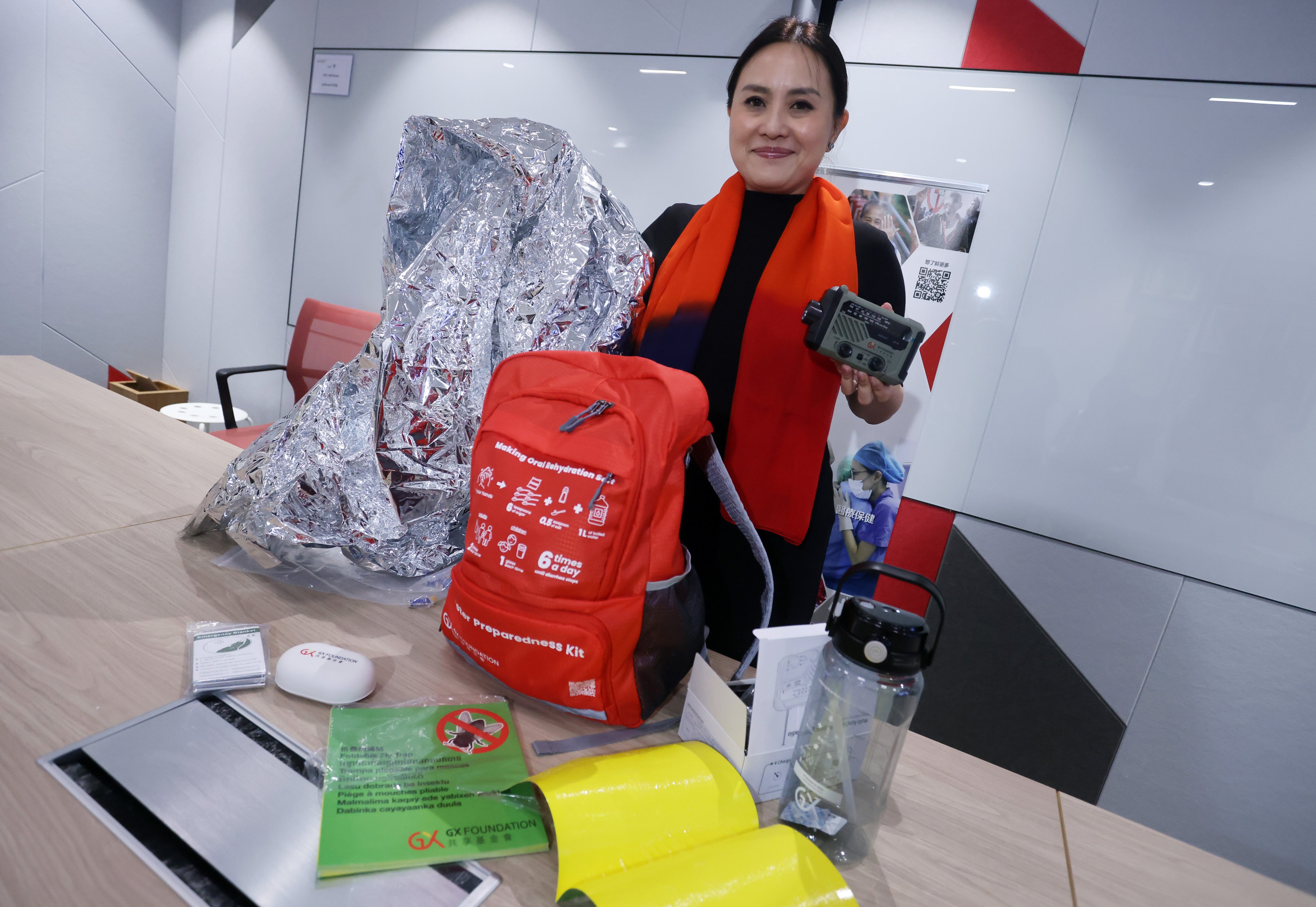 GX Foundation CEO Emily Chan, pictured with a disaster preparedness kit, says the charity’s work has achieved success over the years.  Photo: Jonathan Wong