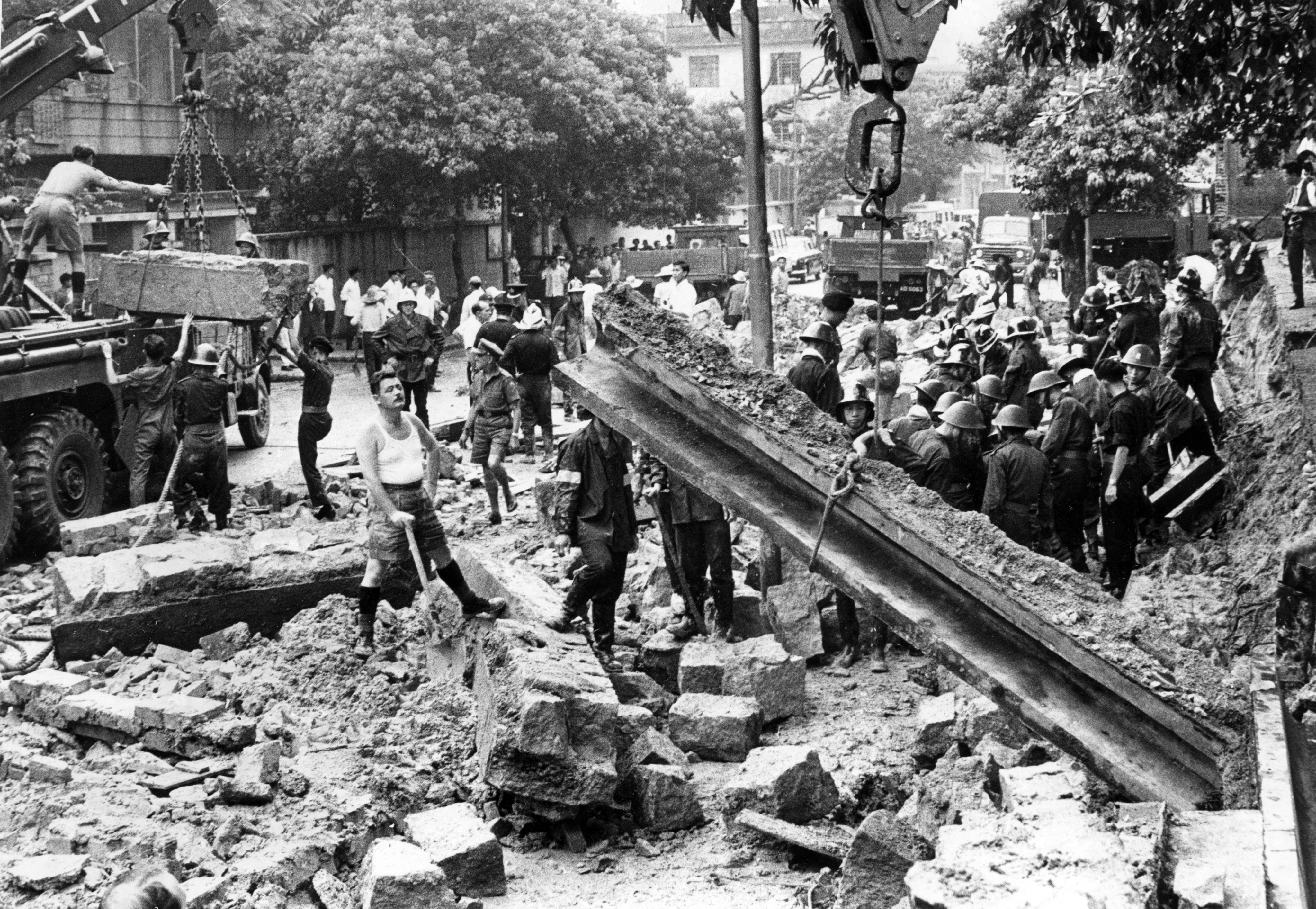 A young mother of four and five children were killed when a 10ft high wall collapsed near a primary school in June 1966. Photo: SCMP Archives