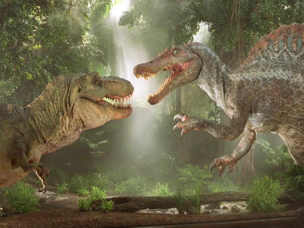 A T-Rex and a Spinosaurus square up in a still from Jurassic Park 3. A new study raises the possibility that dinosaurs could be used to study ancient tumours, helping to fill in the “jigsaw” of cancer’s molecular building blocks.